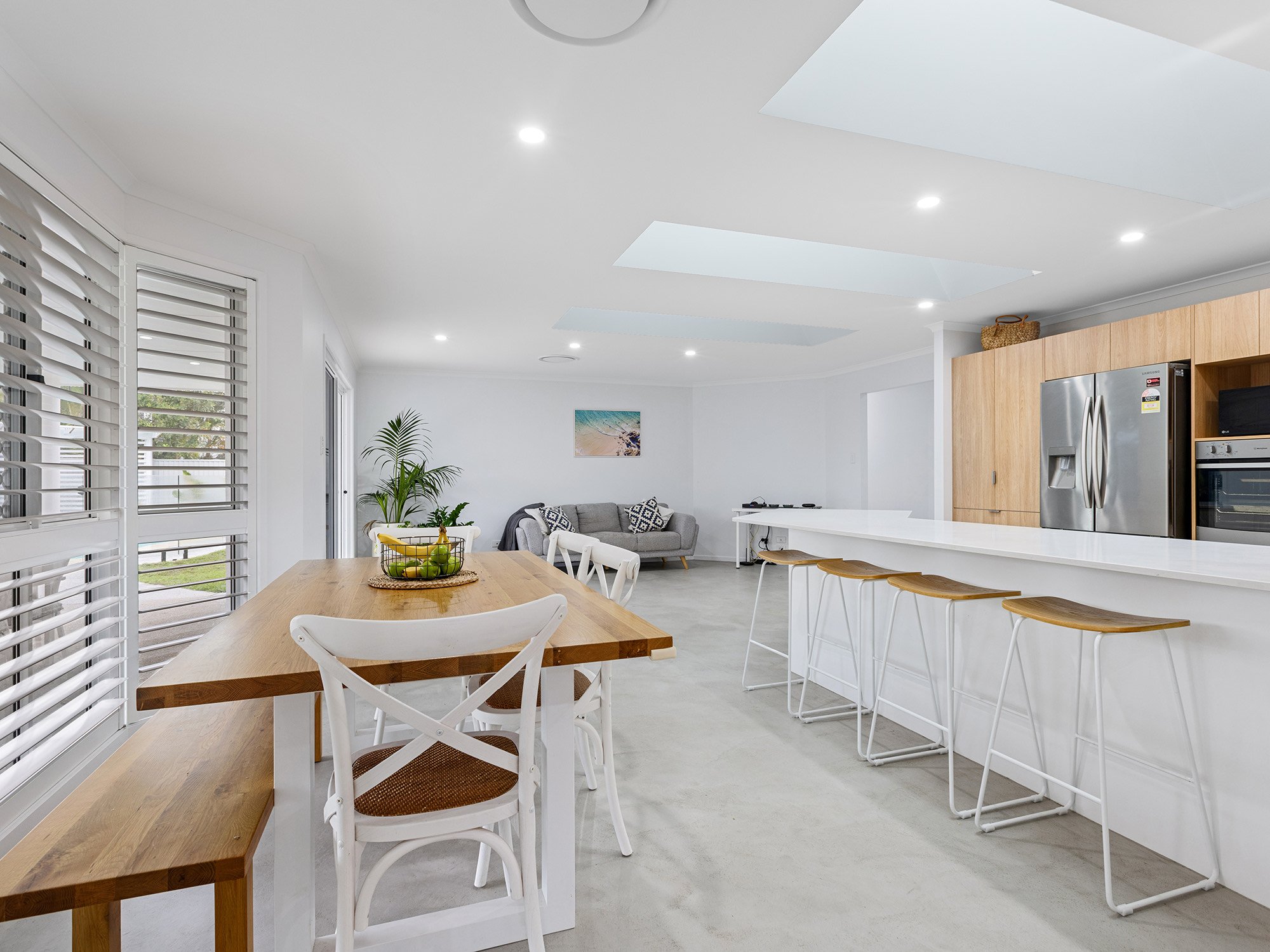 Three skylights in a kitchen dining space in Sunshine Coast