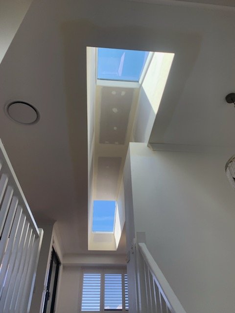 Double skylights to lighten up a stairway area