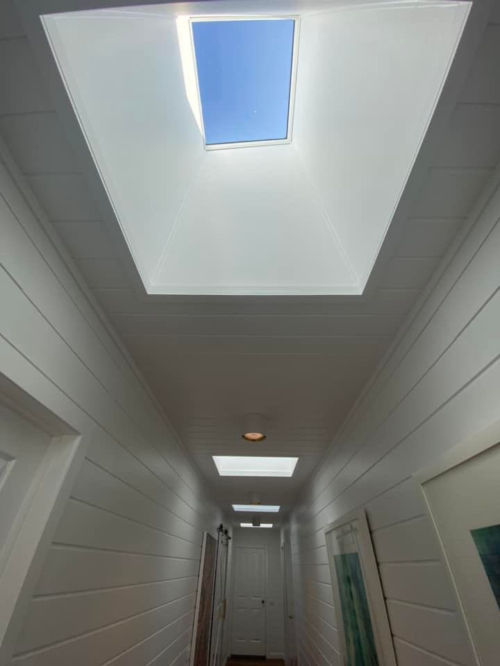 Let light into dark areas with a hallway skylight
