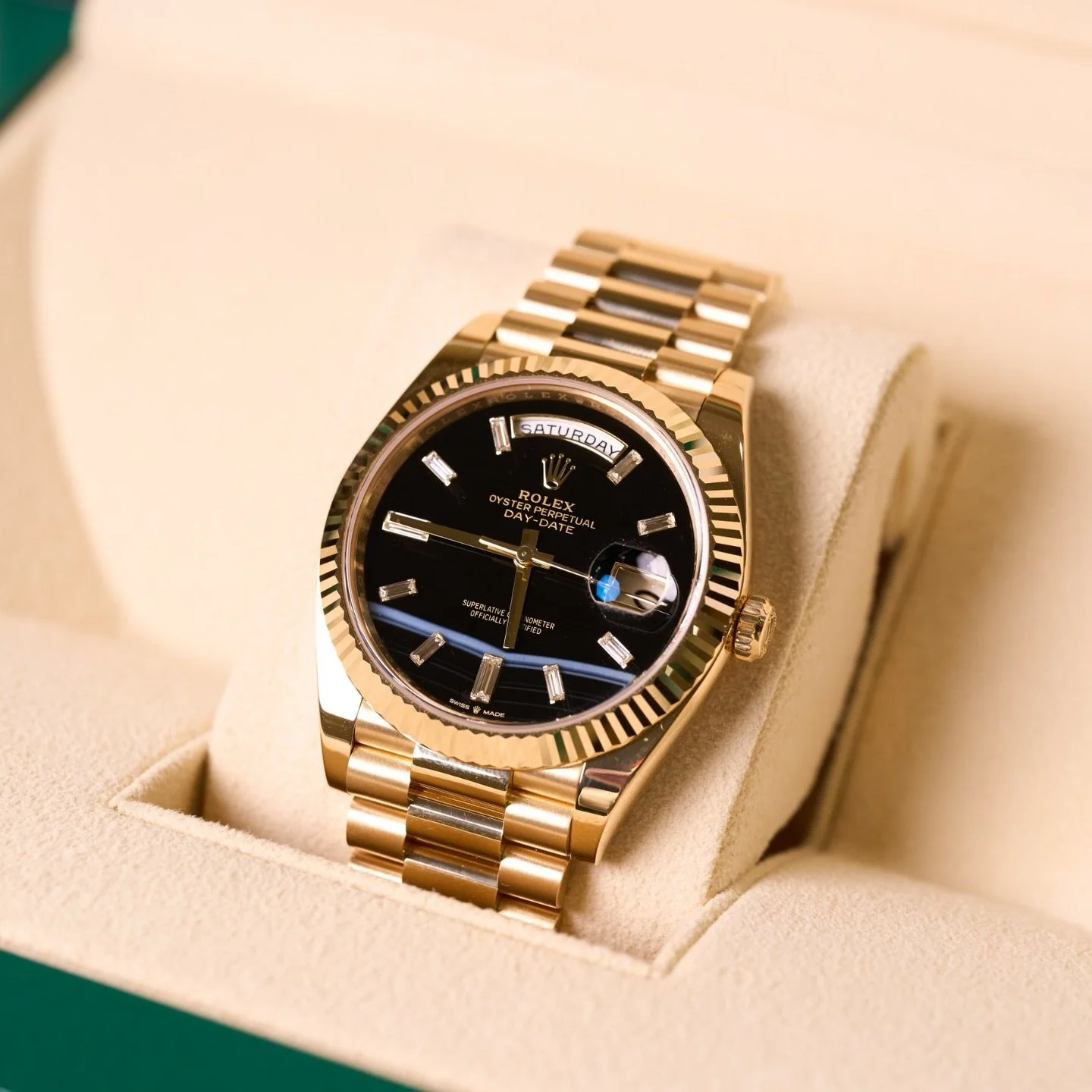 Rare. Refined. Unmistakable. ✨

Featuring a coveted black onyx dial, factory baguette diamond hour markers, and an 18k yellow gold President bracelet, this Rolex Day-Date is the definition of timeless luxury. A true collector&rsquo;s piece that blend