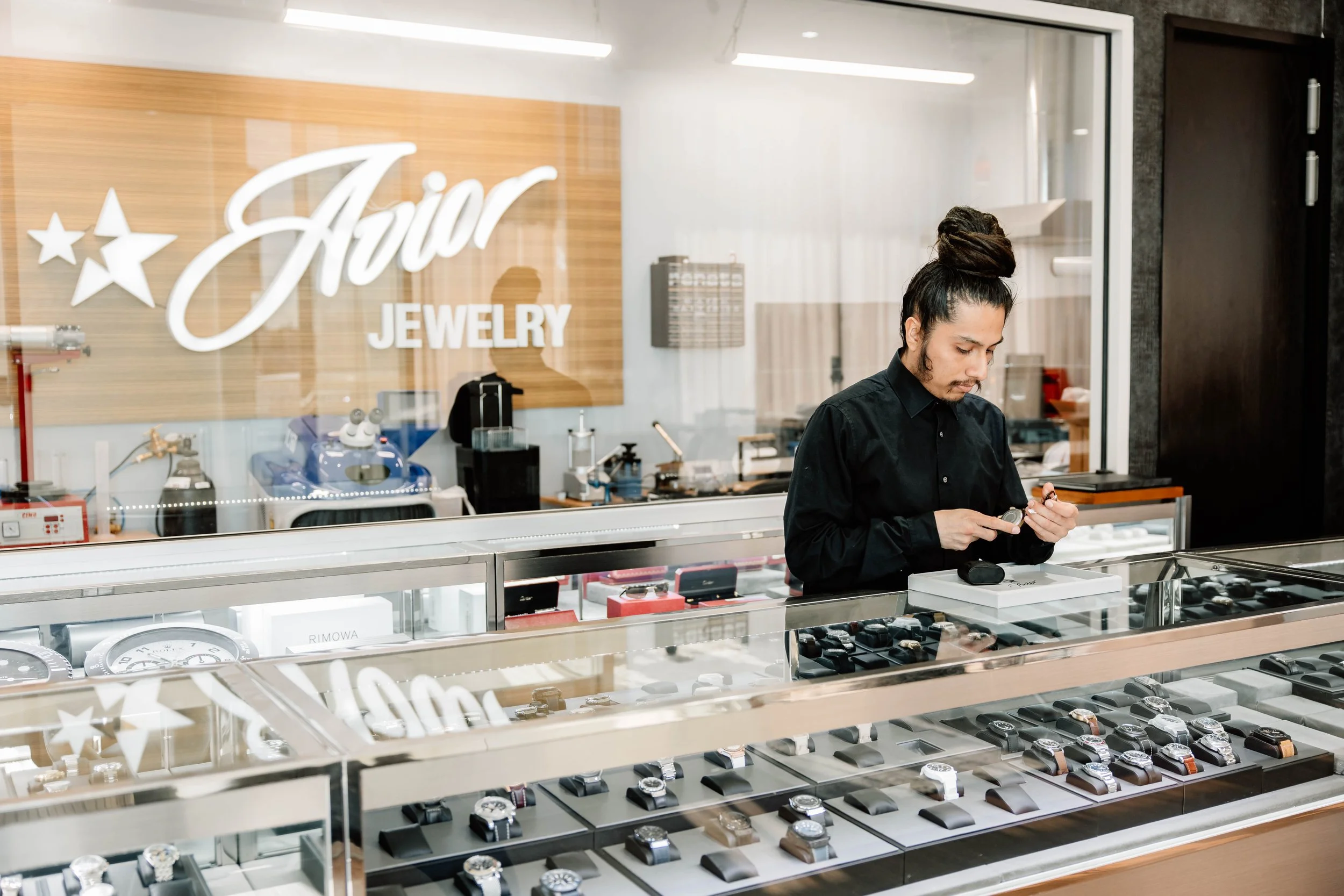 Brian the watch expert assessing luxury watches at Avior Watch Boutique in Dallas