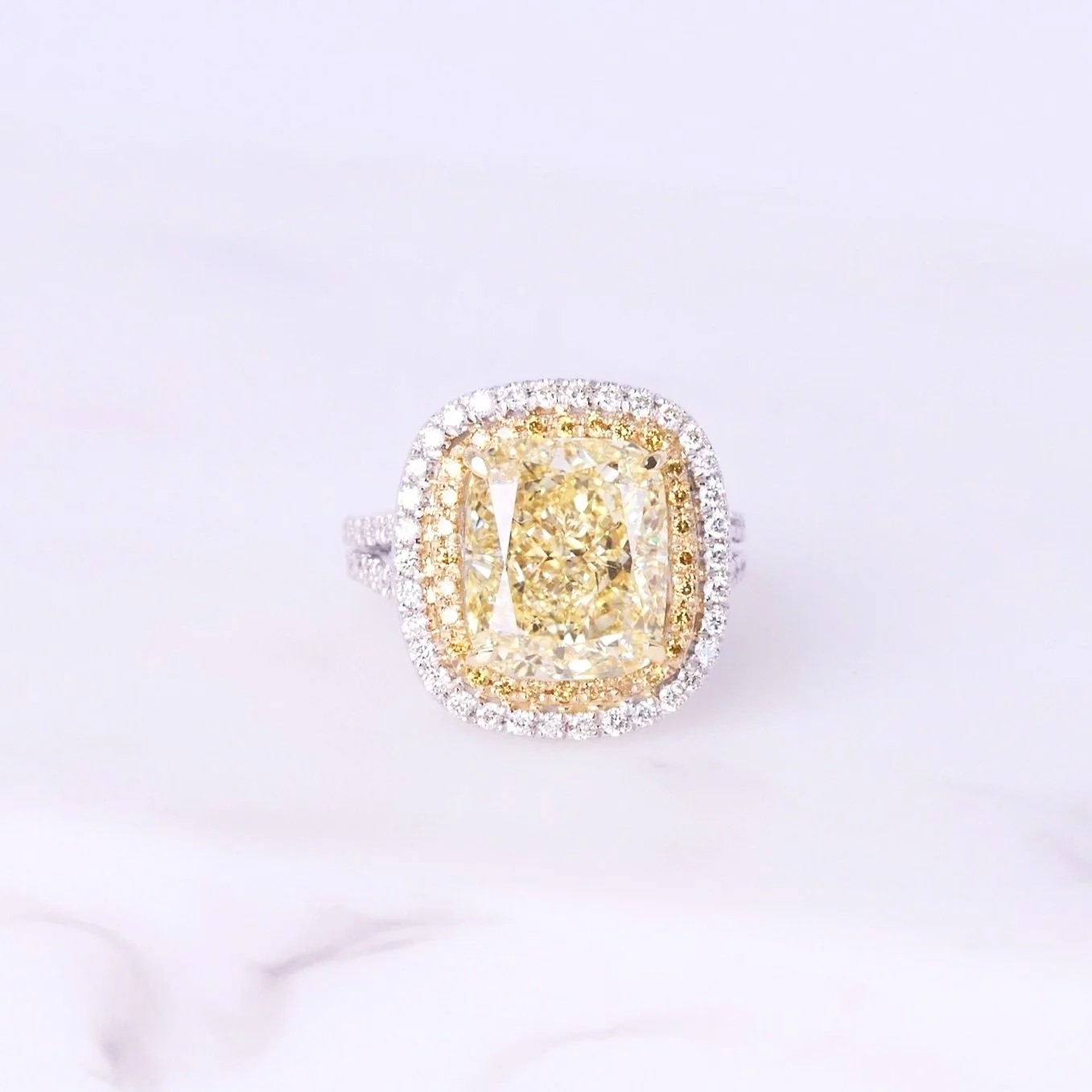 10 Carat Cushion Cut- Natural Fancy Yellow diamond with double halo and split shank setting