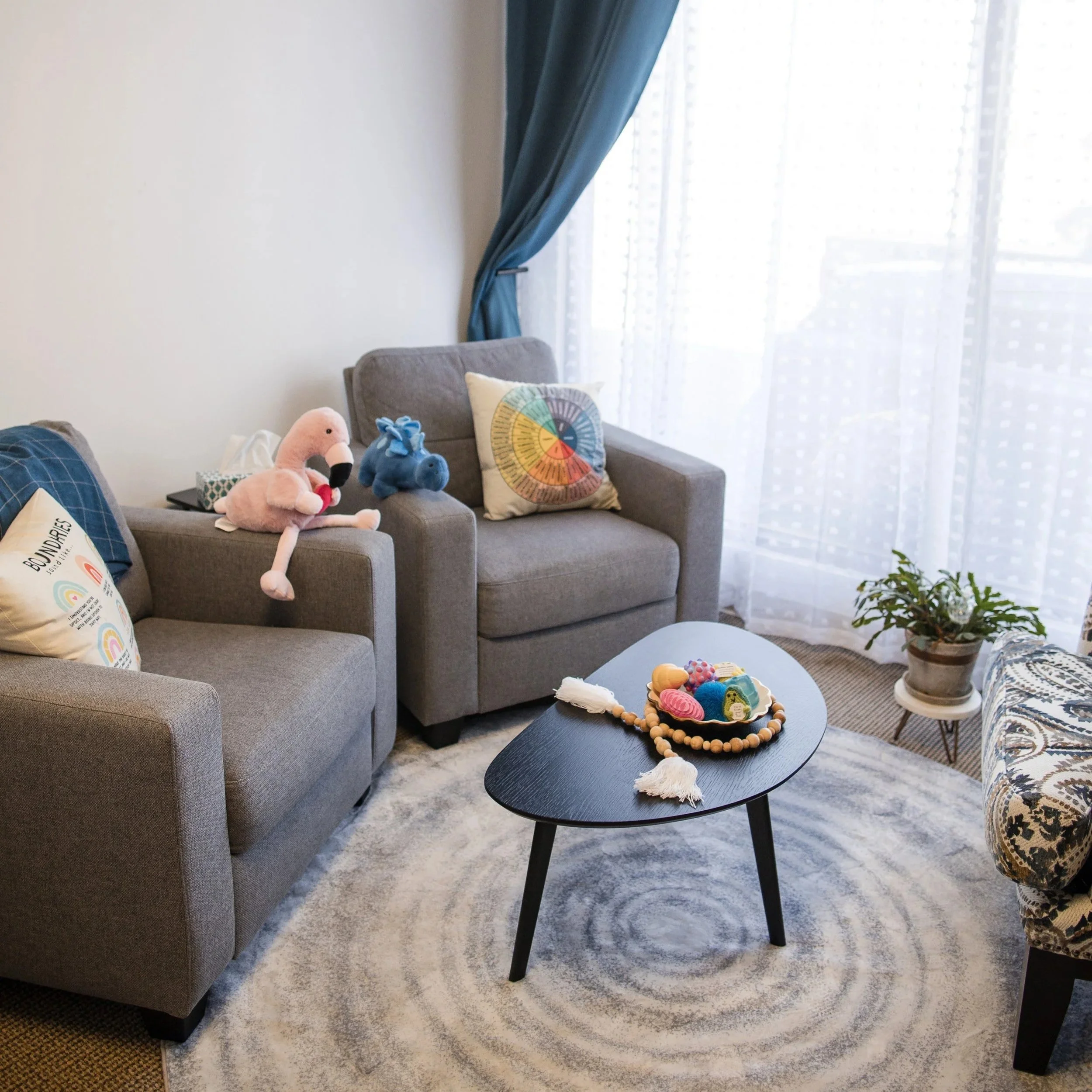 A welcoming therapy office at A Thread of Clarity in West Edmonton, designed to feel calm, safe, and comfortable for in-person counselling sessions.