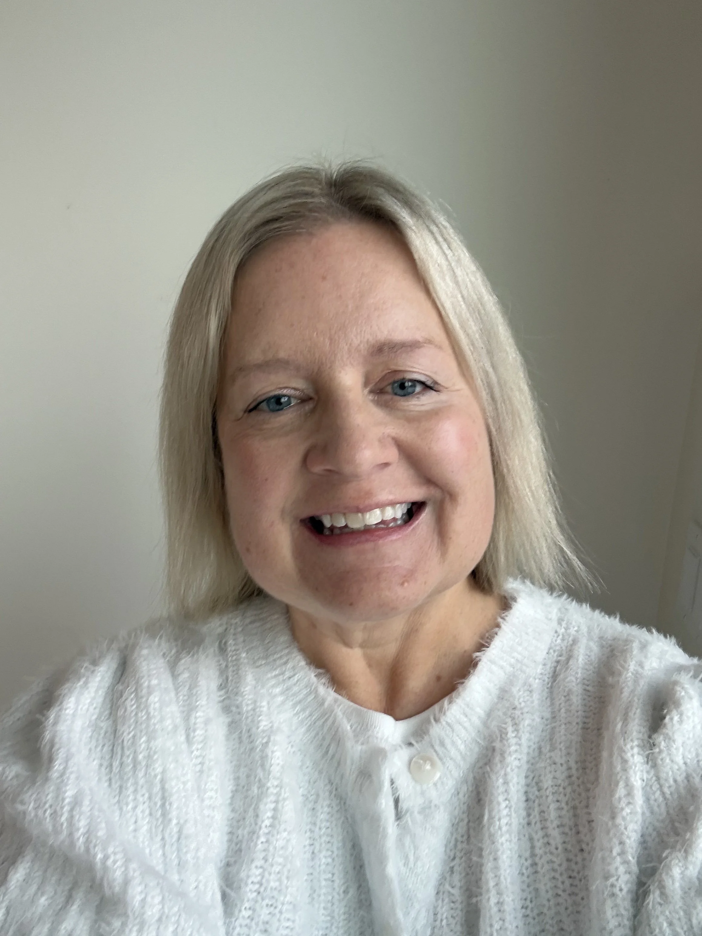 Headshot of Ana Meger-Hoeft, Canadian Certified Counsellor at A Thread of Clarity, LGBTQ+ allied, supporting children 6+ and adults navigating addiction and substance use, trauma &  PTSD, and grief.