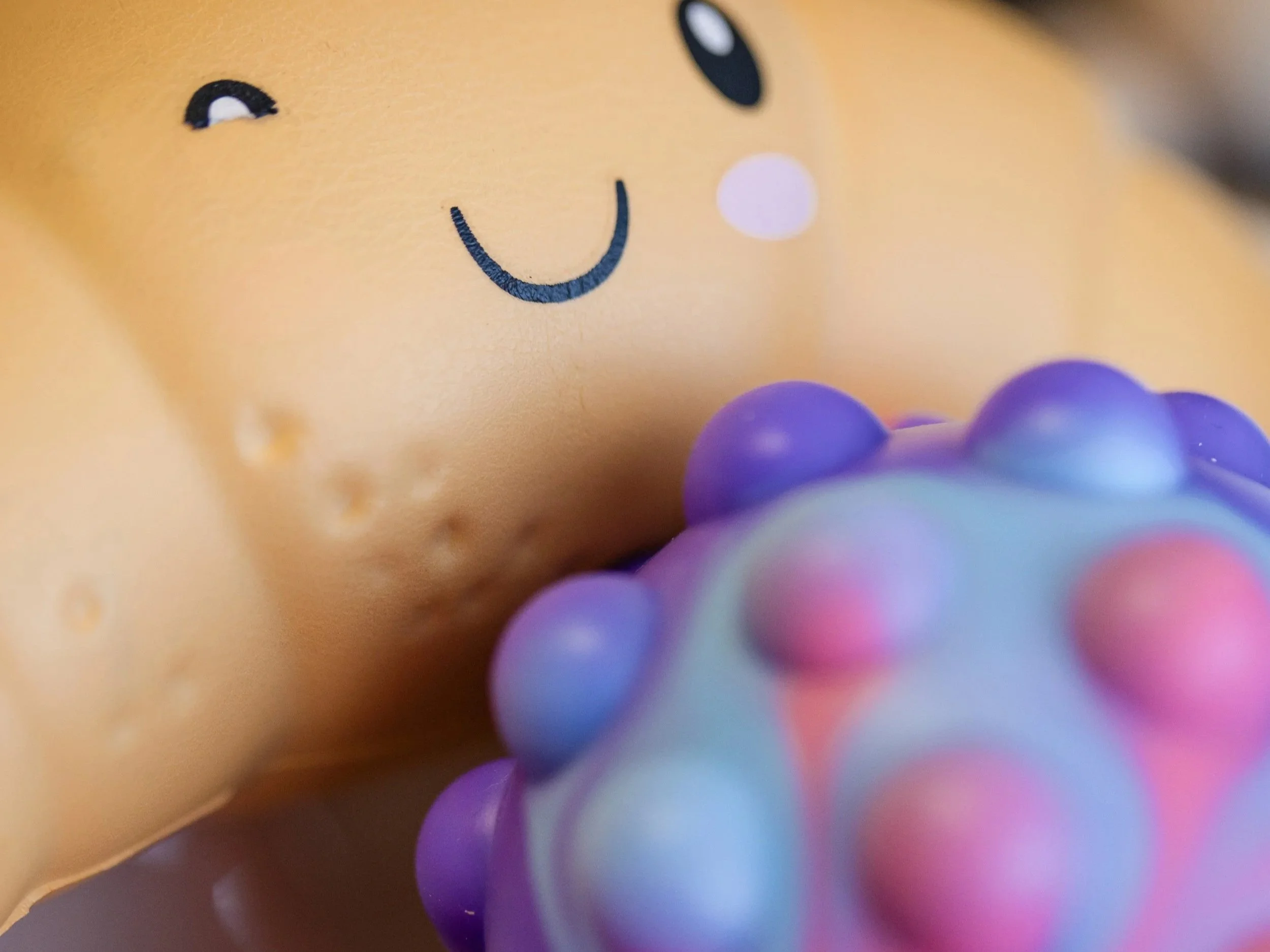 A selection of sensory tools in a therapy office at A Thread of Clarity in Edmonton, available to support emotional regulation for clients of all ages.
