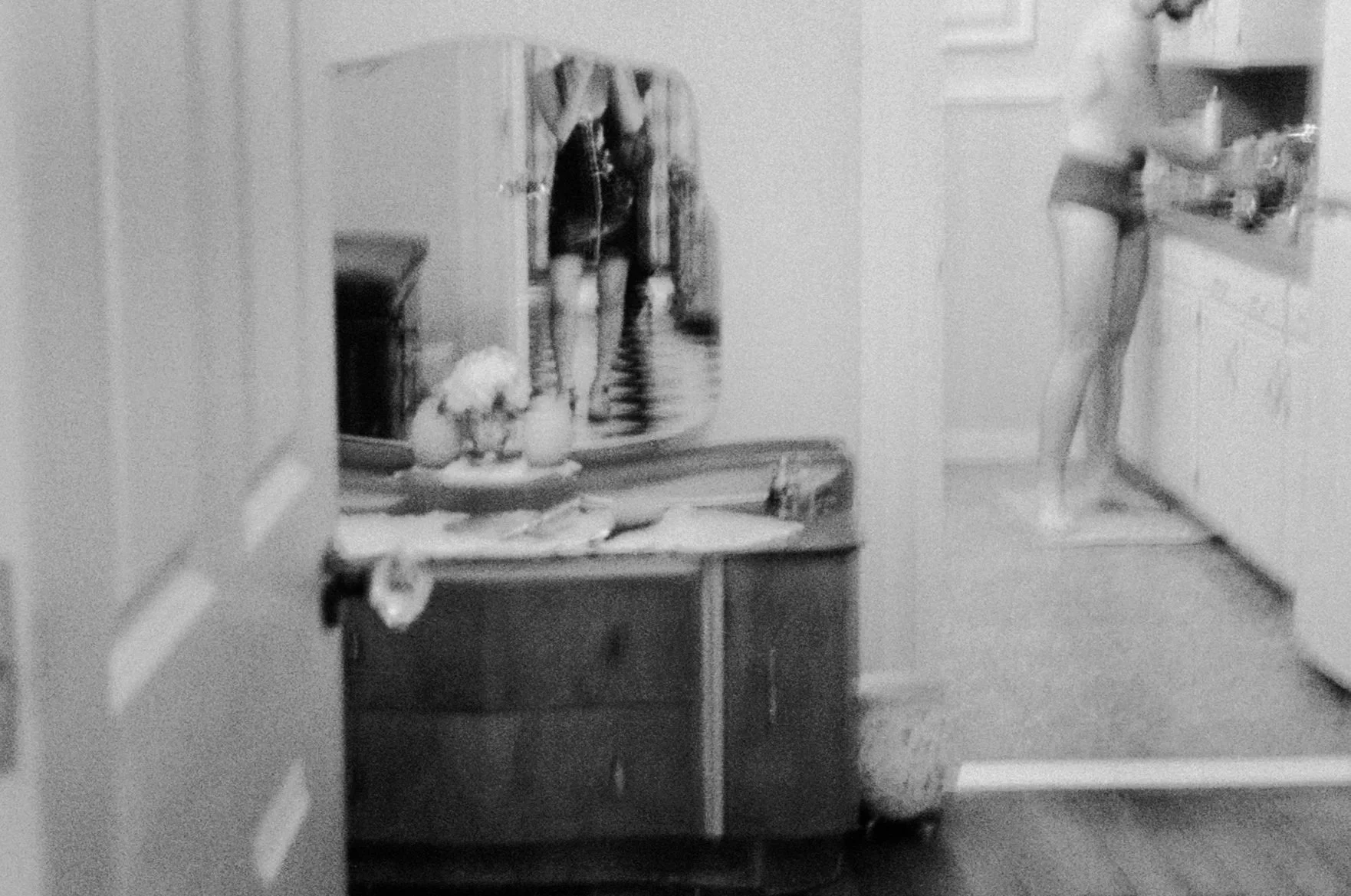 The sounds of the party are a distant symphony of hedonism—laughter echoes, punctuated by the sharp, authoritative report of the whip. It is Domina Rei's tea party in San Francisco, a night of sacred surrender for a chosen few. This is a familiar roo