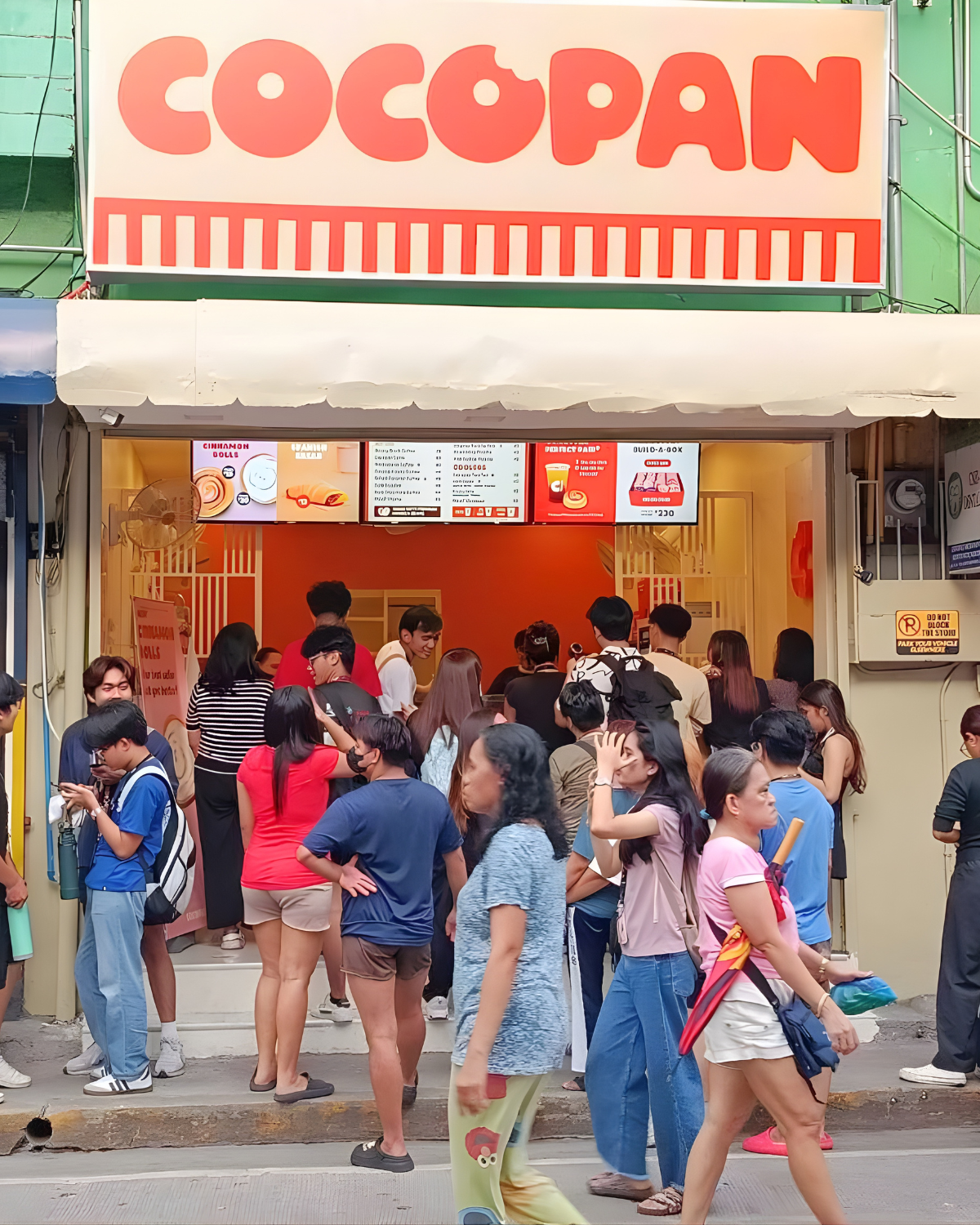 Customers lining up outside a Cocopan neighborhood bakery