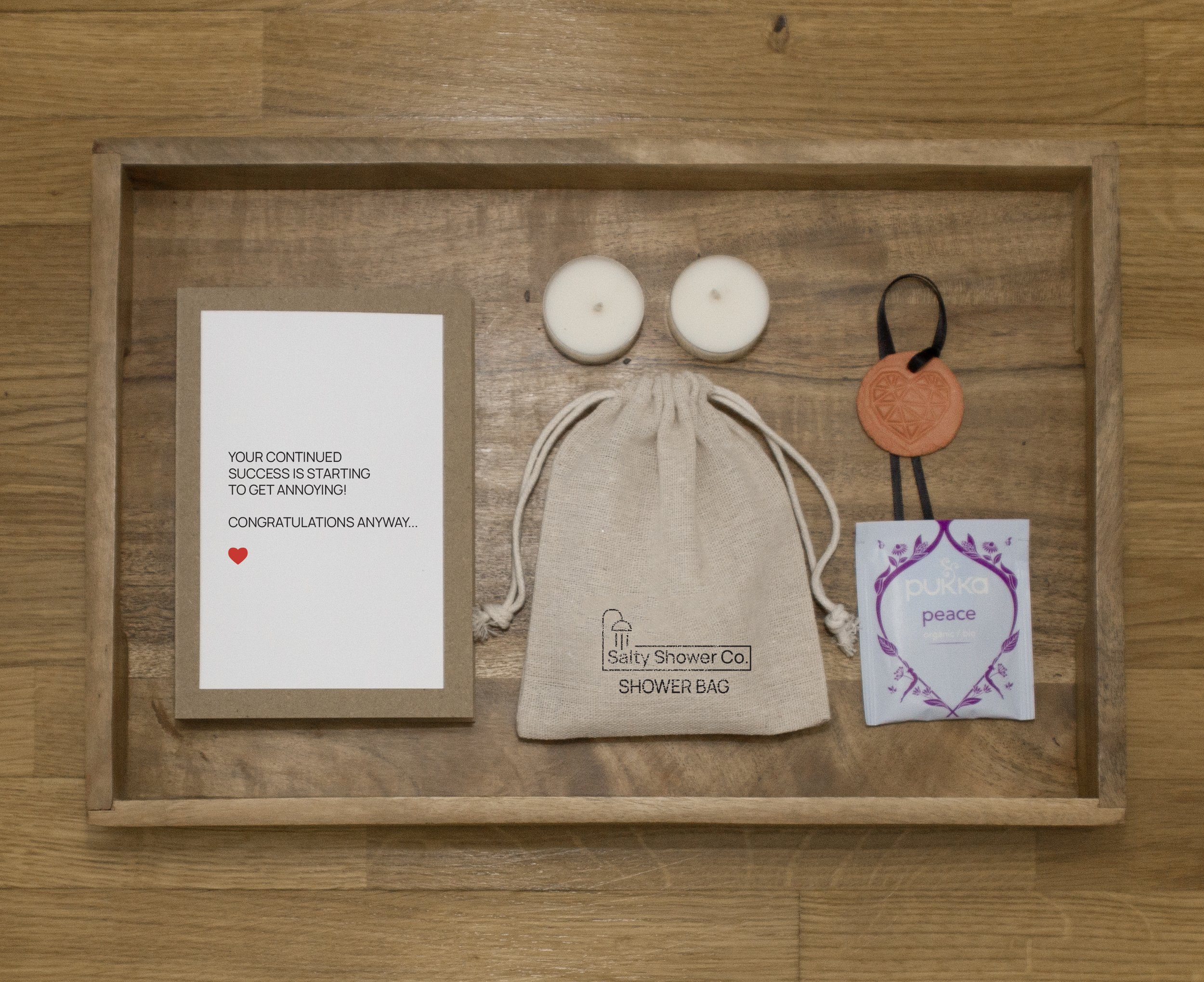 Salty Notes - Pack contains: A funny little card, A Salty Shower bag, A calming tea bad and two scented tea lights - Everything you need for a heavenly evening of self-care calm.
