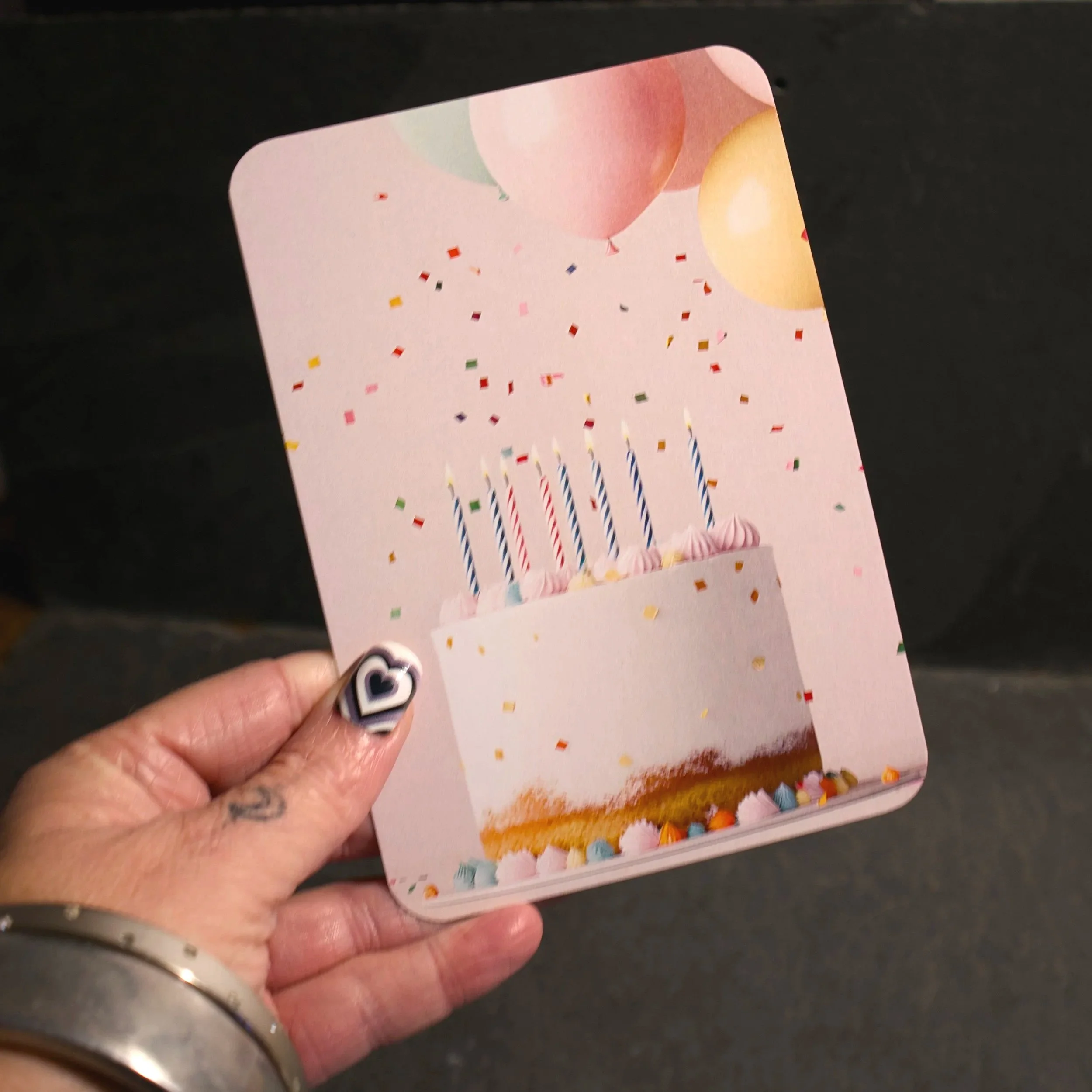 Happy Cake! photograph of a cute cake with confetti and balloons - Salty Note