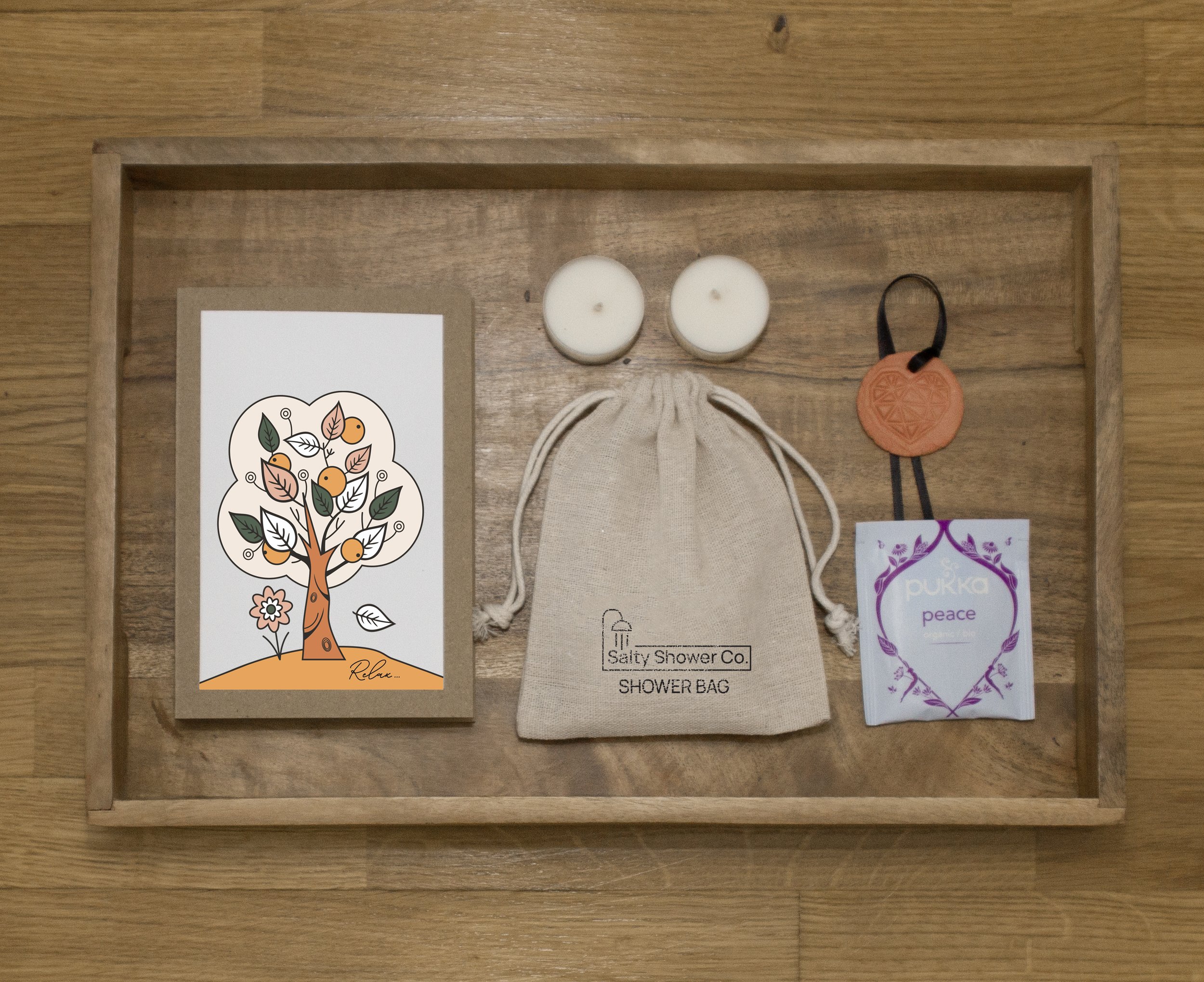 Salty Notes - Pack contains: A funny little card, A Salty Shower bag, A calming tea bad and two scented tea lights - Everything you need for a heavenly evening of self-care calm.