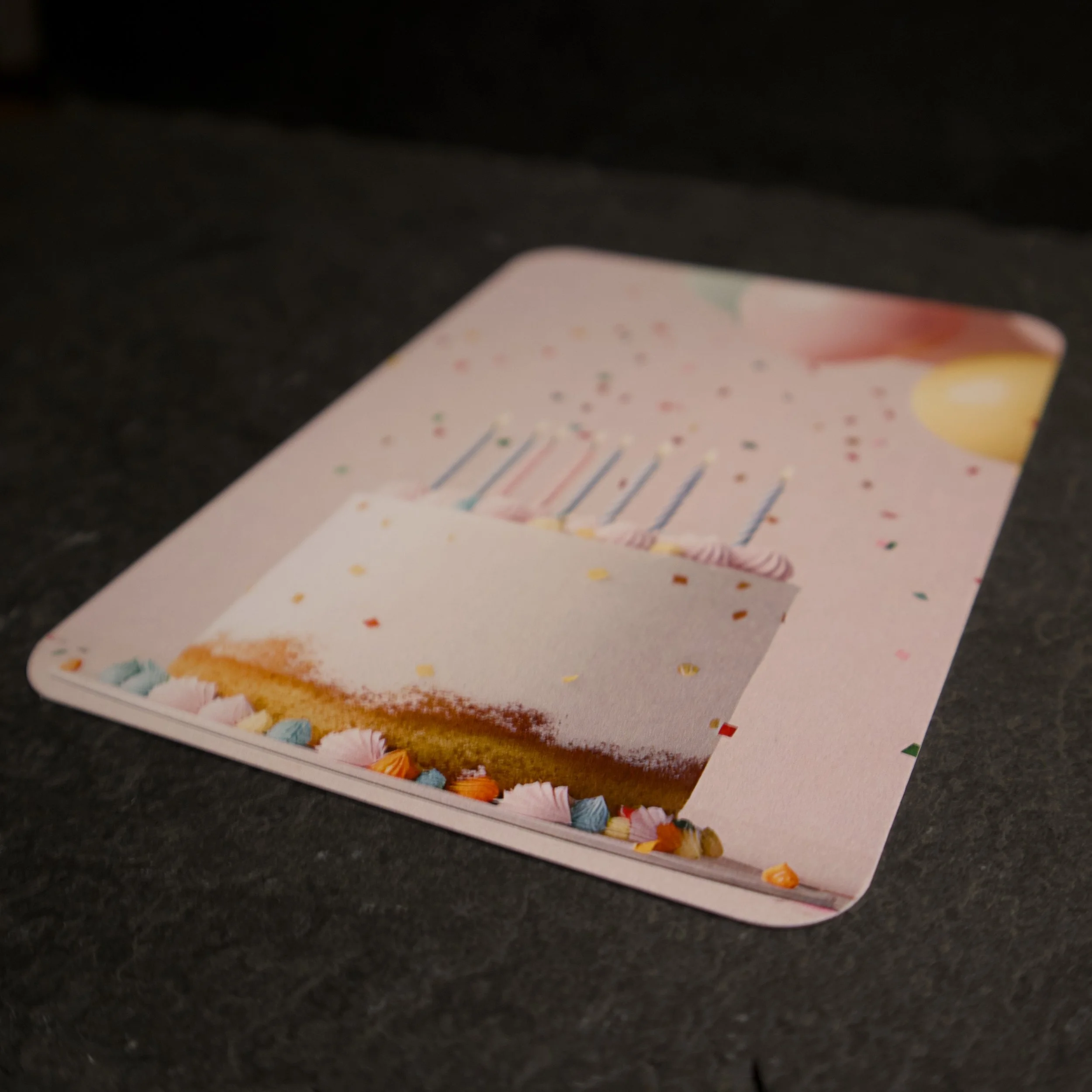 Happy Cake! photograph of a cute cake with confetti and balloons - Salty Note