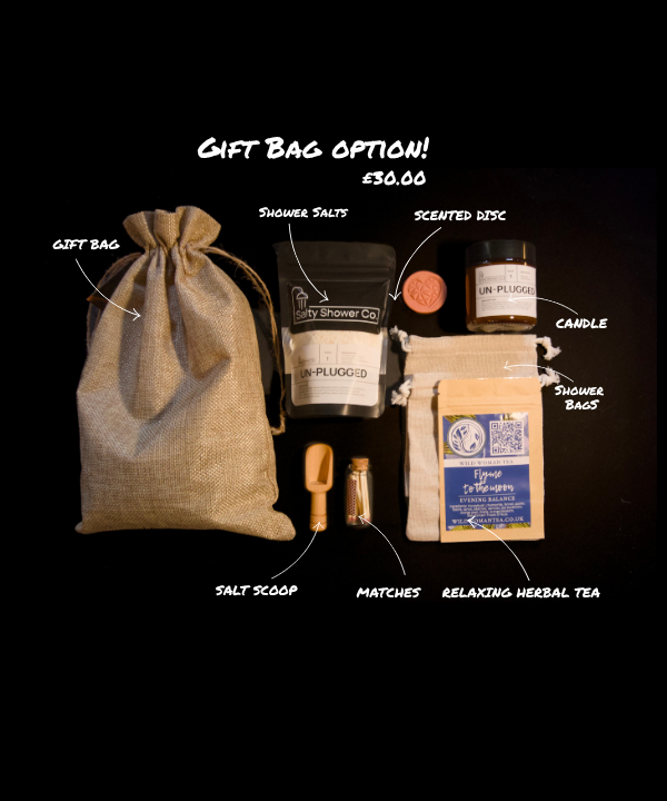 Salty Notes Premium Gift Bag Upgrade featuring a rustic burlap gift bag, Un-Plugged soy candle, wooden salt scoop, glass jar of matches, scented disc, and relaxing herbal tea