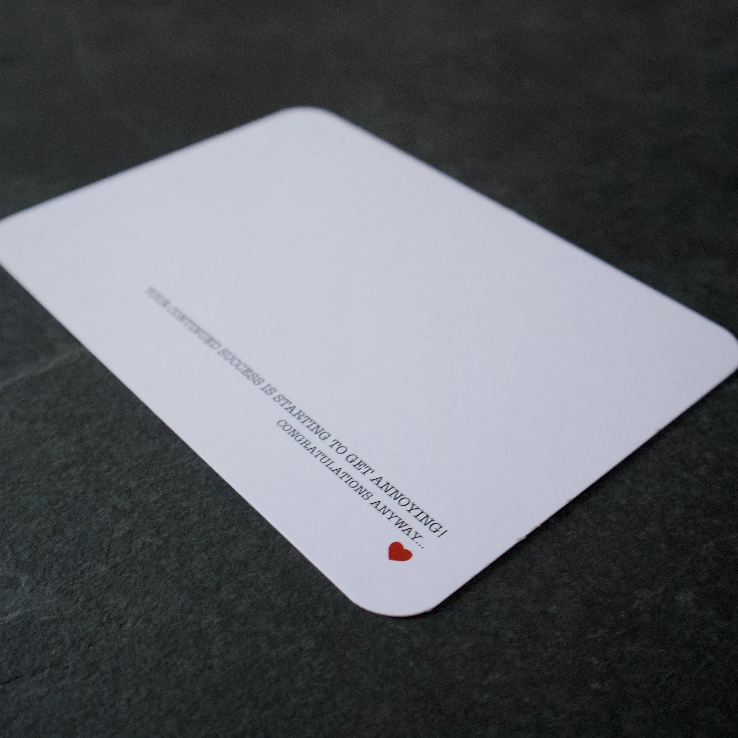 Your continued success is starting to get annoying! Congratulations anyway... a funny, heartfelt text design postcard - Salty Note