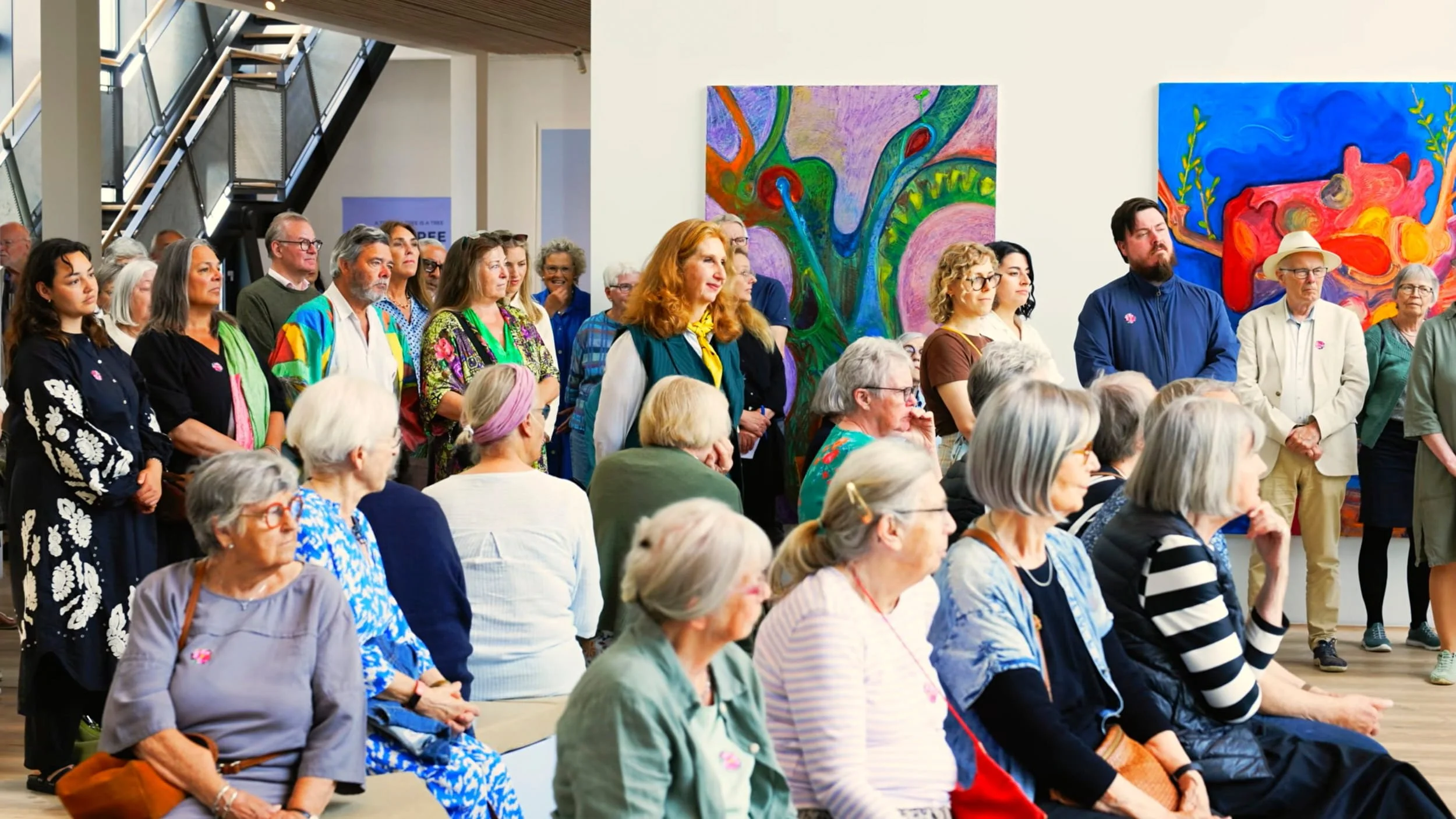Audience participating in the opening of the exhibition; A Tree Is A Tree Is A Tree by Maria Dubin