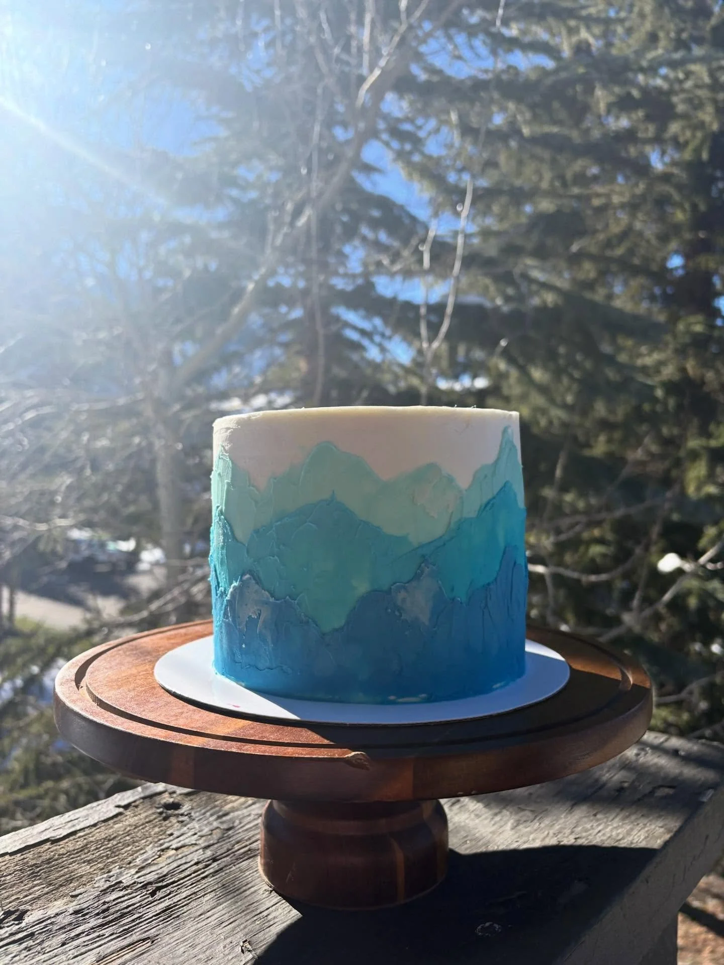 A blue ombr&eacute; mountain cake for Triston&rsquo;s 16th!❄️

Order your custom cake at JuliaEveBaking.com🌷