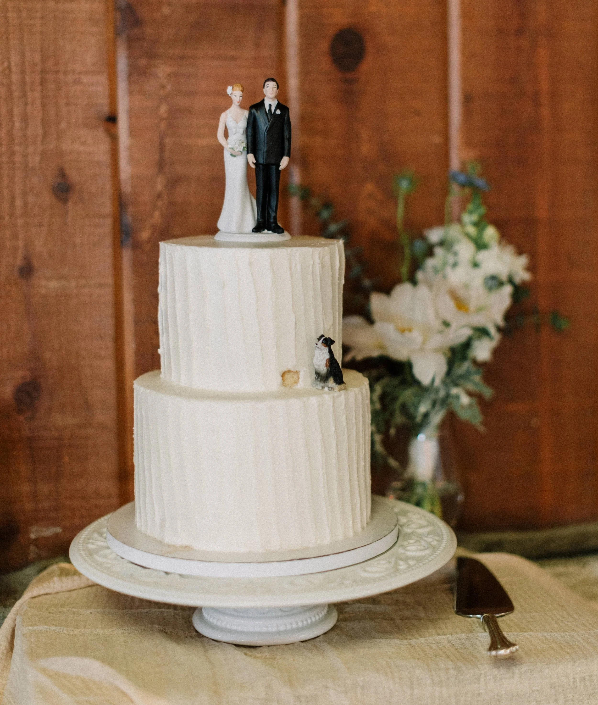 2 Tiered Wedding Cake with couple and dog cake topper