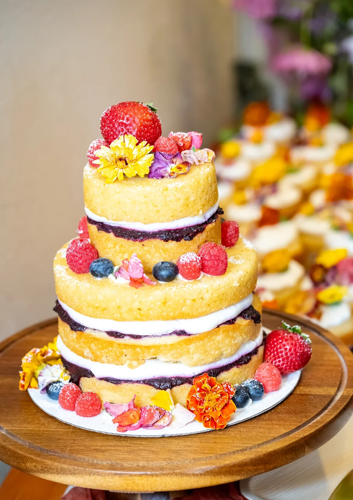 2 Tiered Naked Wedding Cake, Triple Berry Flavor with Fresh Fruit and Edible Flowers for Wedding in Mammoth Lakes, CA