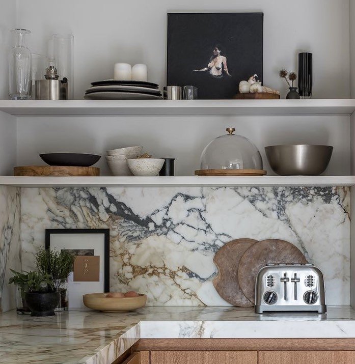 Doing a little styling research for an upcoming project and came across this beautiful design by @bartamerica. Absolutely adore this combination of natural stone and timber! 

#kitchendesign #interiors #shelving #styling #interiordesign #kitchen #joi