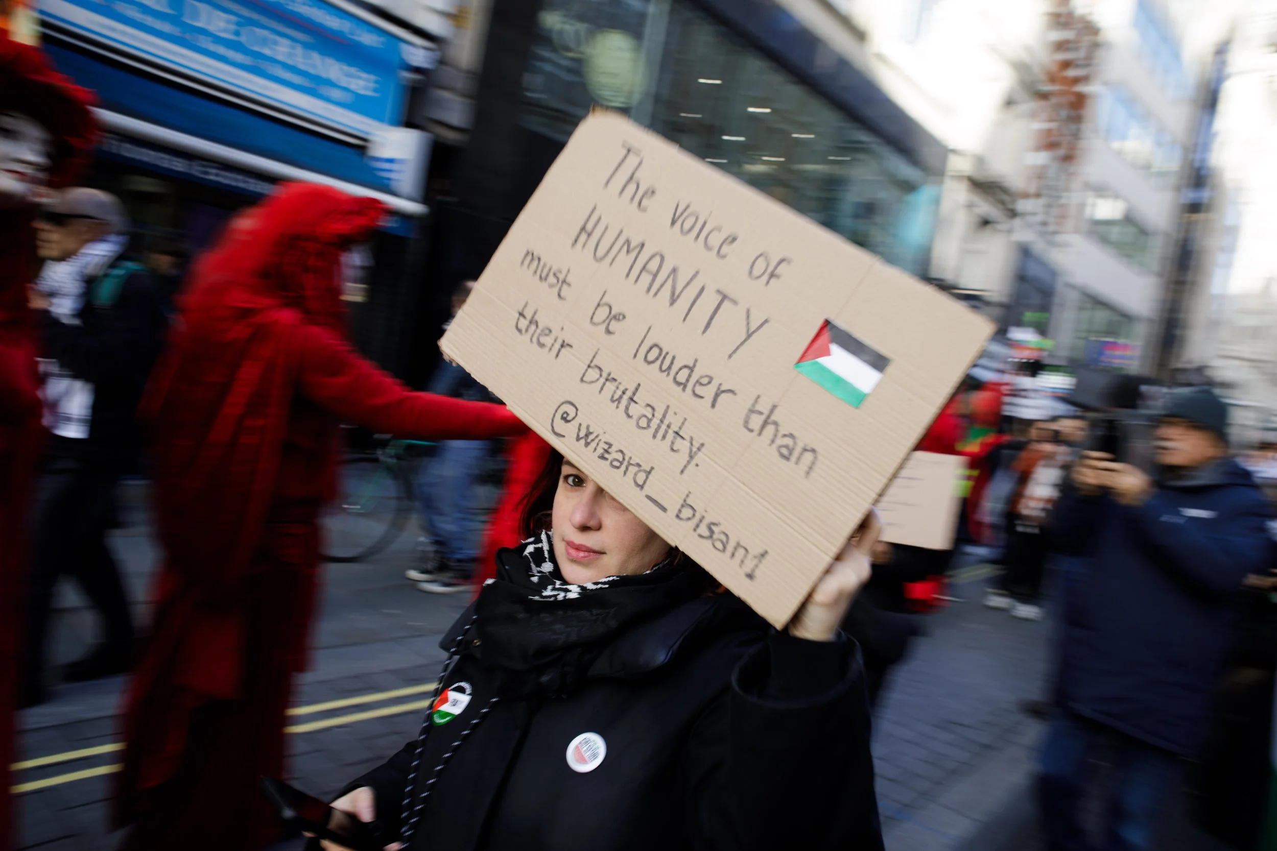 UNITED KINGDOM, London 31 January 2026:
Palestine protester holds homemade sign to head forehead. The Palestine Solidarity Campaign March through London today from Russell Square to Whitehall, protesting against the conflict in Gaza. London.
(Credit: