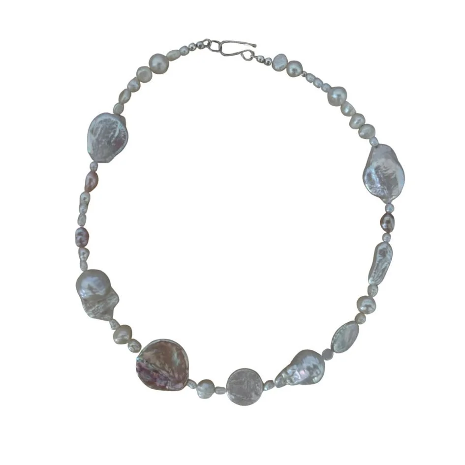 Pearl necklace with irregular-shaped pearls and a hook clasp.