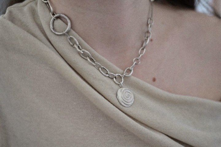 Hardcrafted silver chain with GONIA logo charm