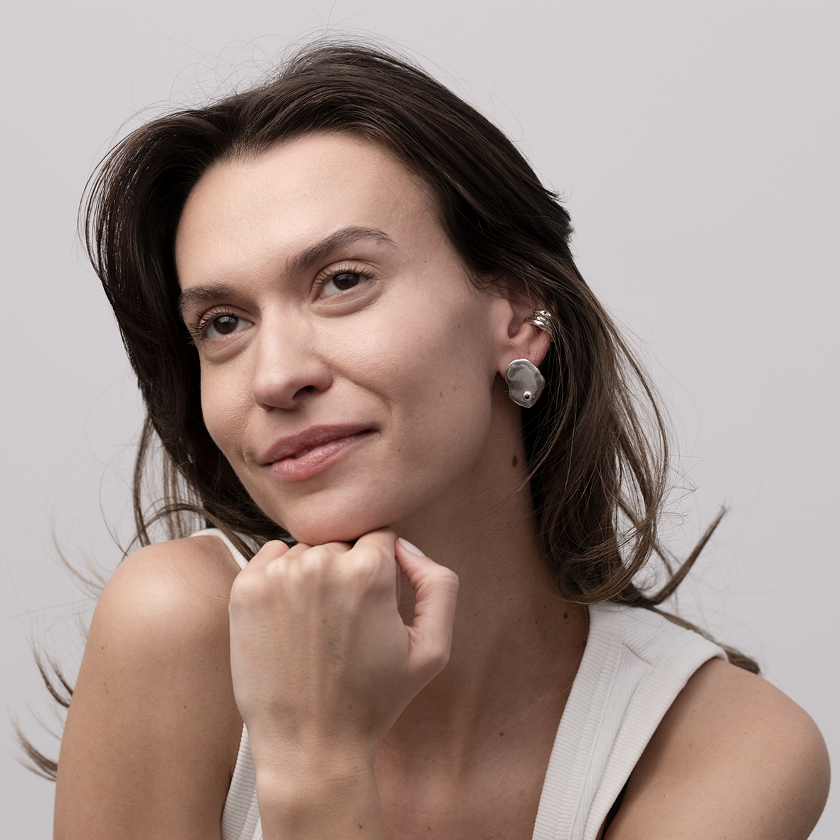 MELT STUD EARING LEFT POZA1.png