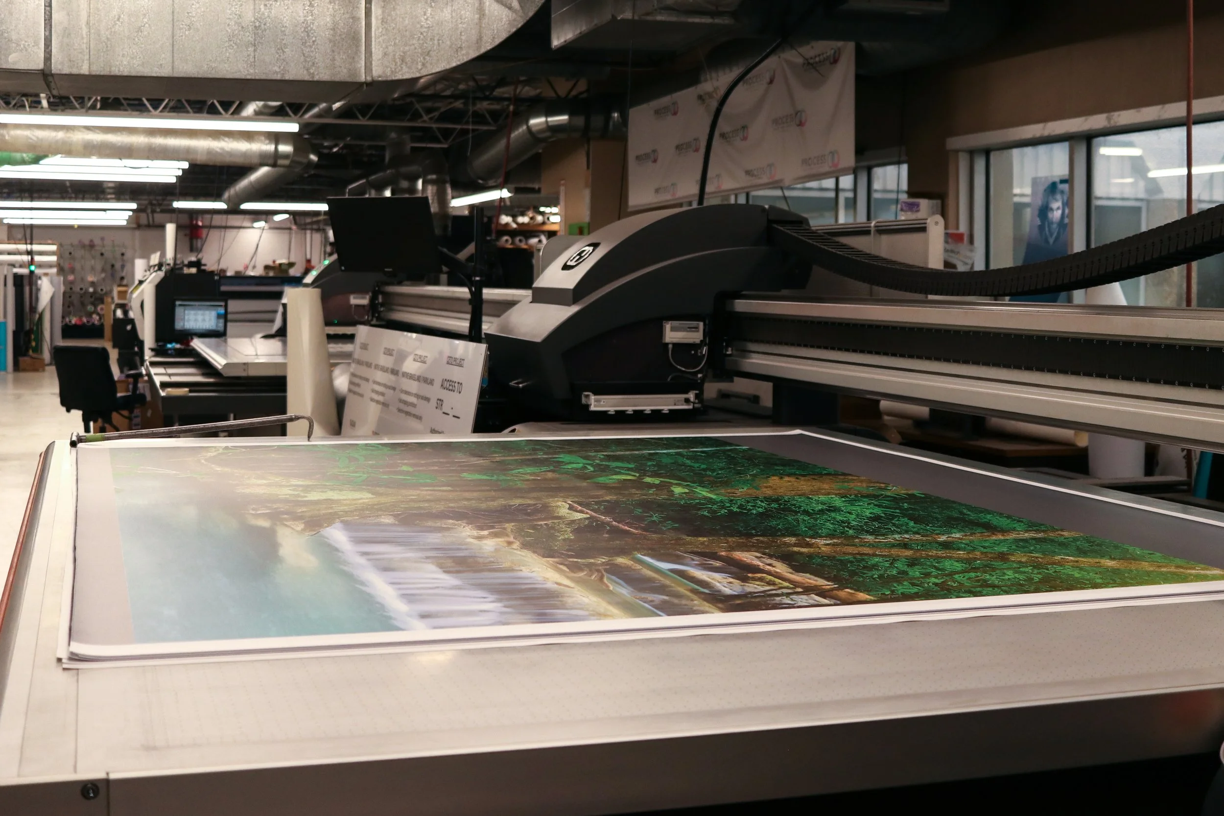 Large-format printing equipment inside Process Color’s Calgary production facility.