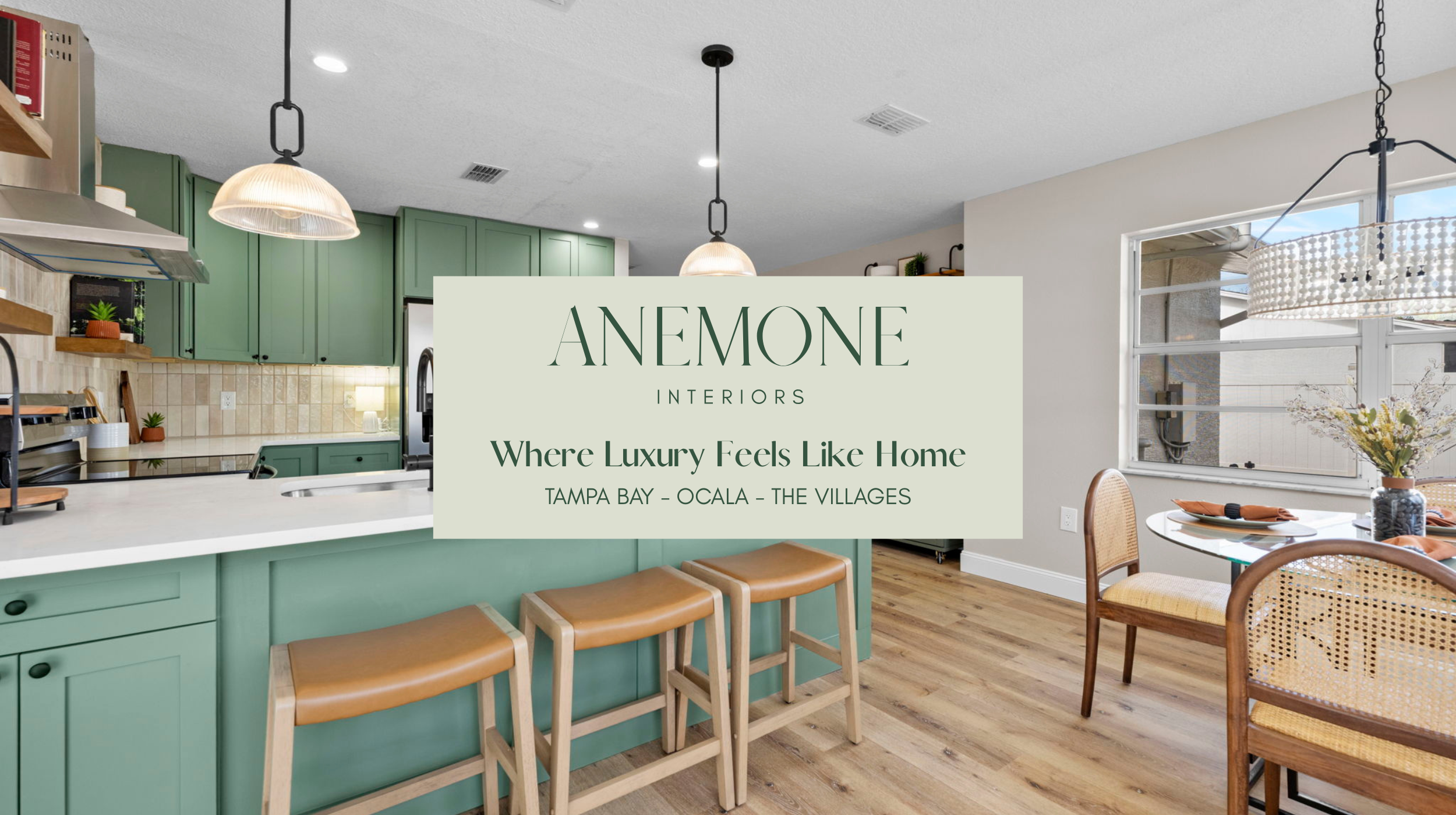 Green kitchen remodel by Anemone Interiors with custom sage cabinetry, warm wood tones, woven dining chairs, quartz countertops, and modern pendant lighting in a Florida home.