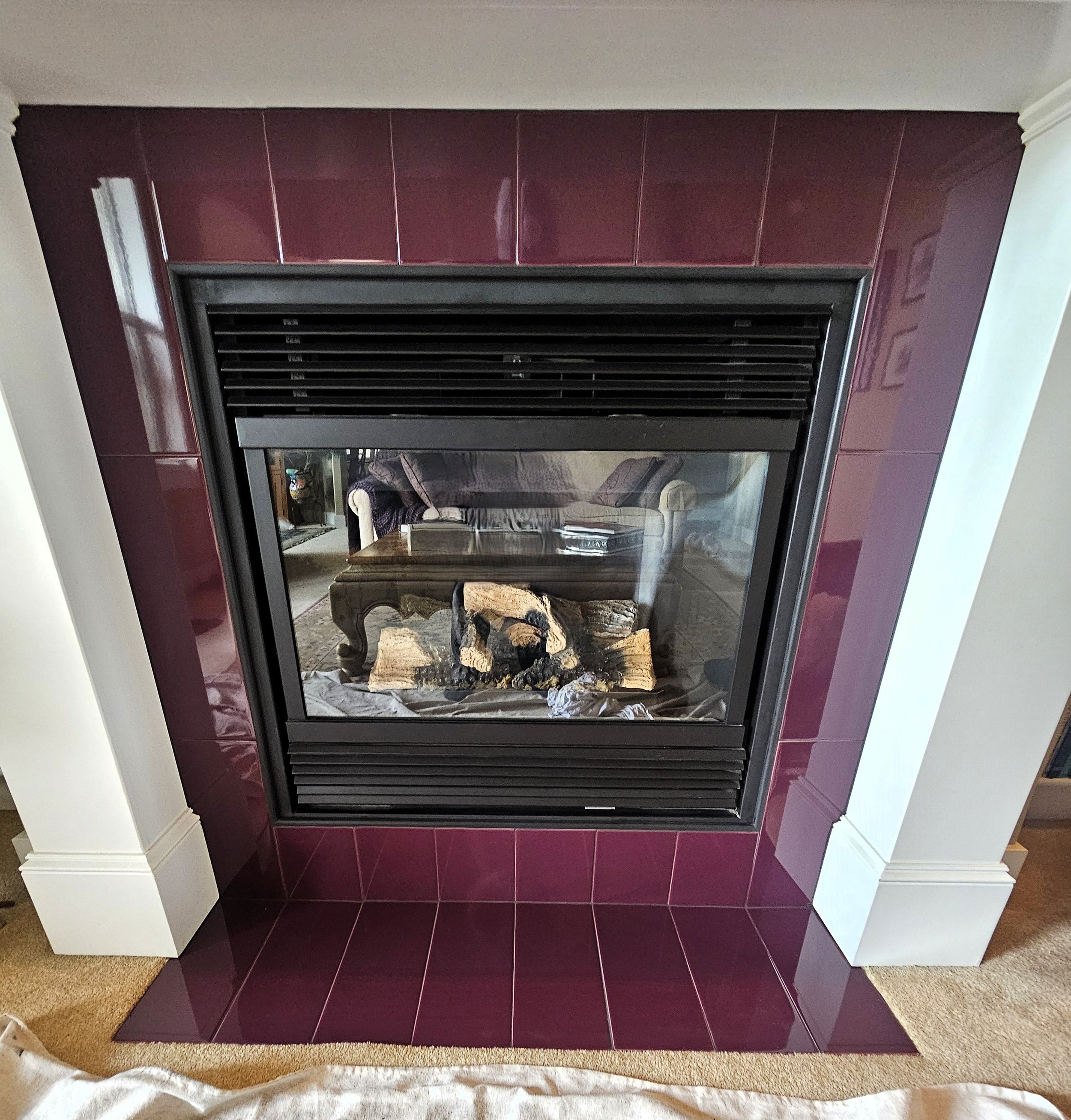 Burgundy tile fireplace