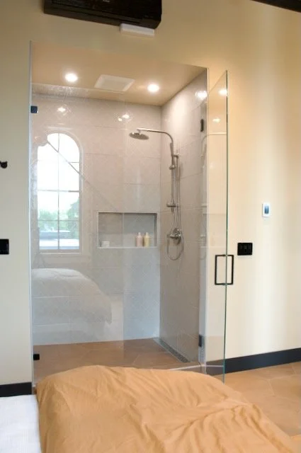 White tile shower with double niche