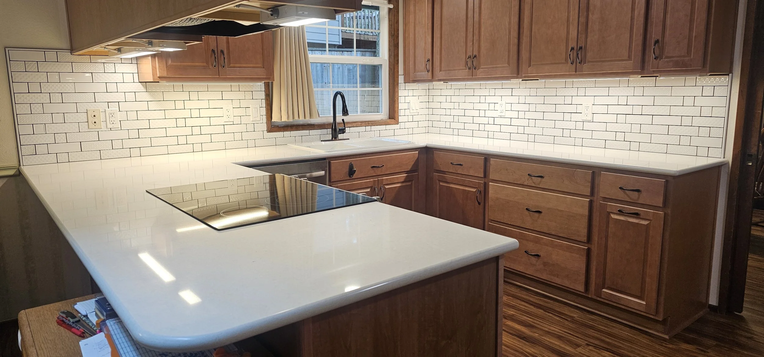 White texture tile kitchen backsplash