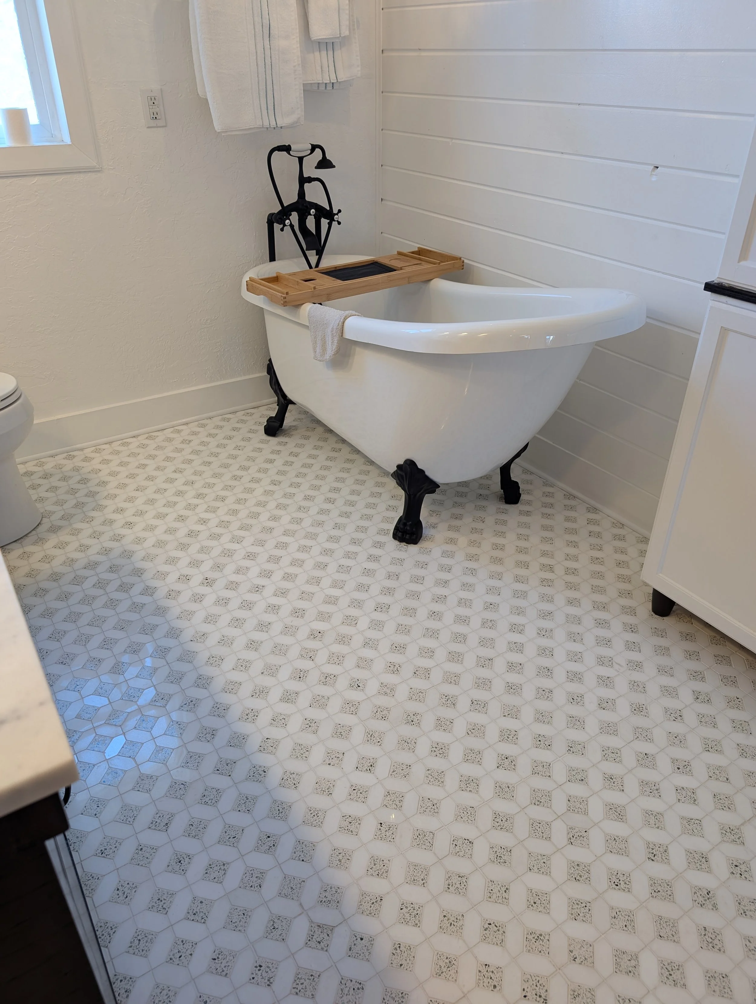 tile floor with clogsfoot tub