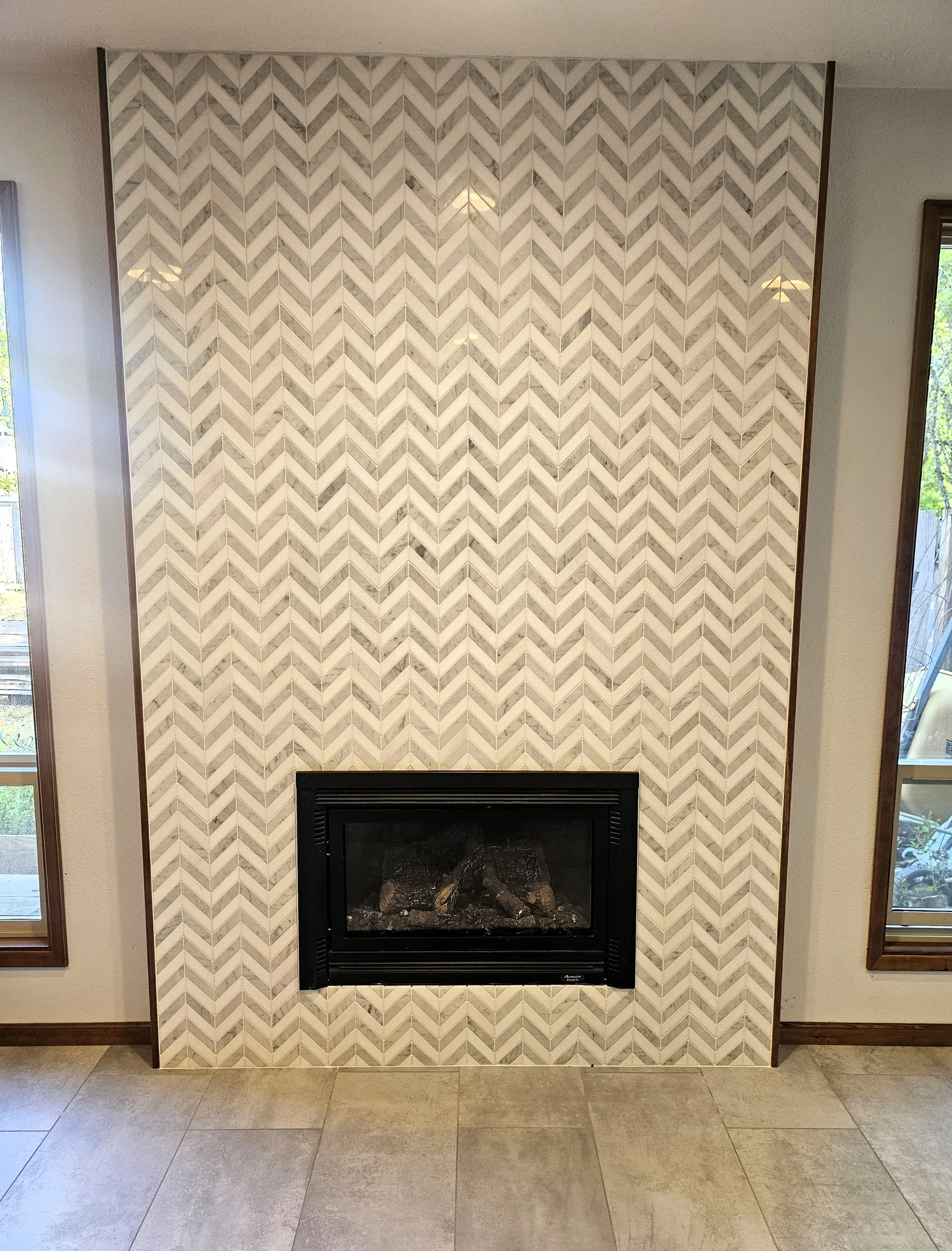 White and grey chervon tile fireplace