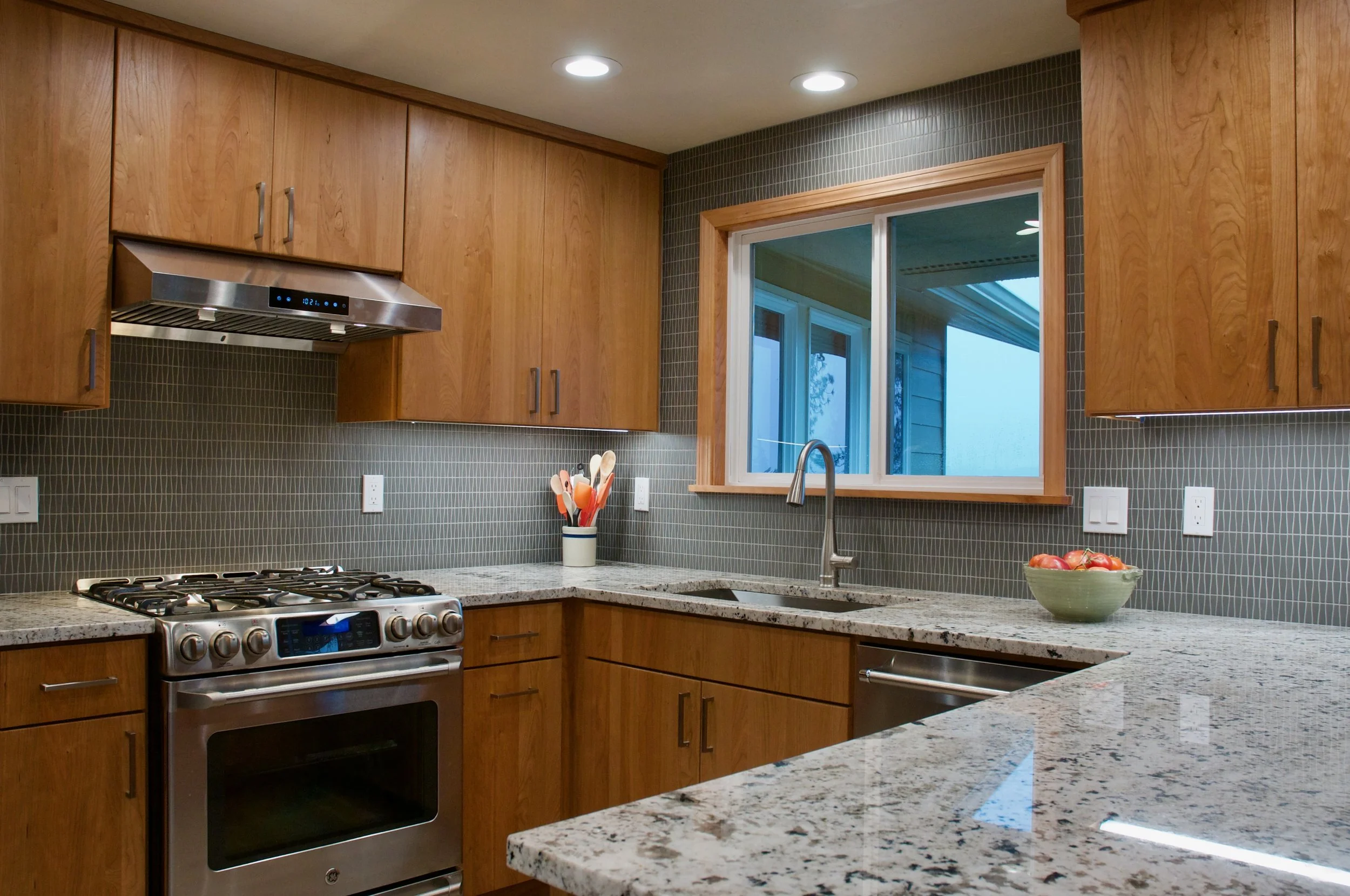 Kitchen with grey tile backsplash