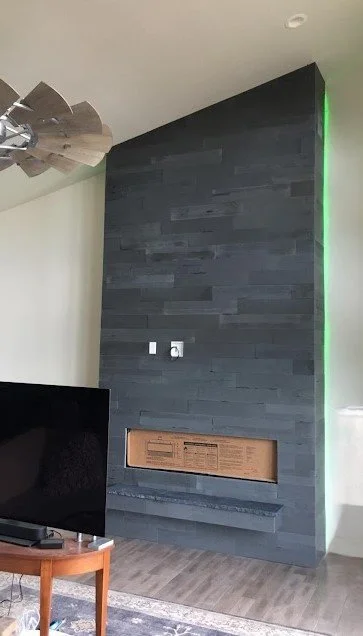 black slate tile with LED lighting fireplace