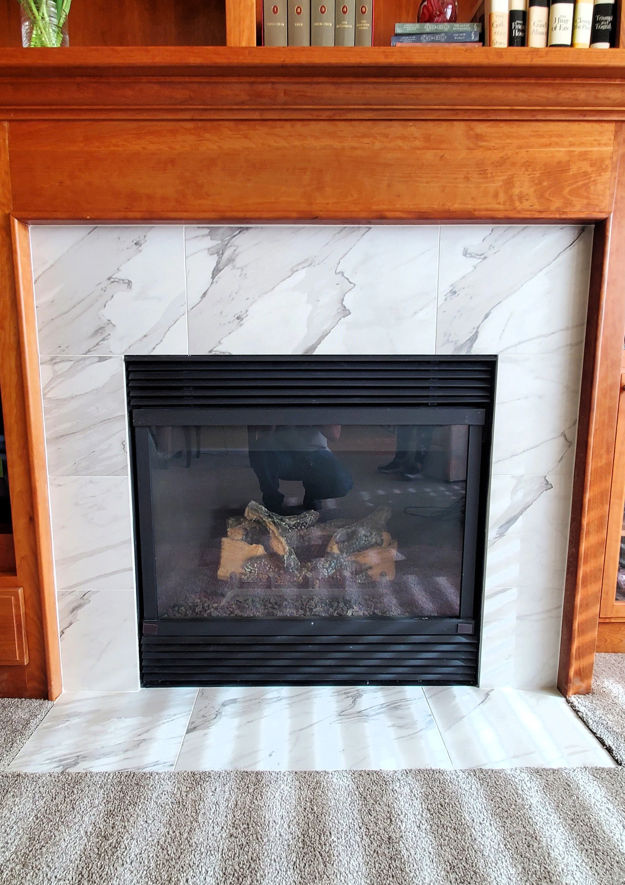 White marble tile fireplace