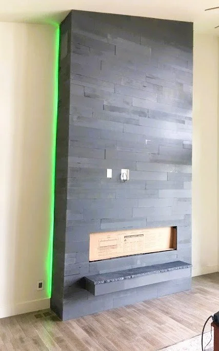 black slate tile with LED lighting fireplace