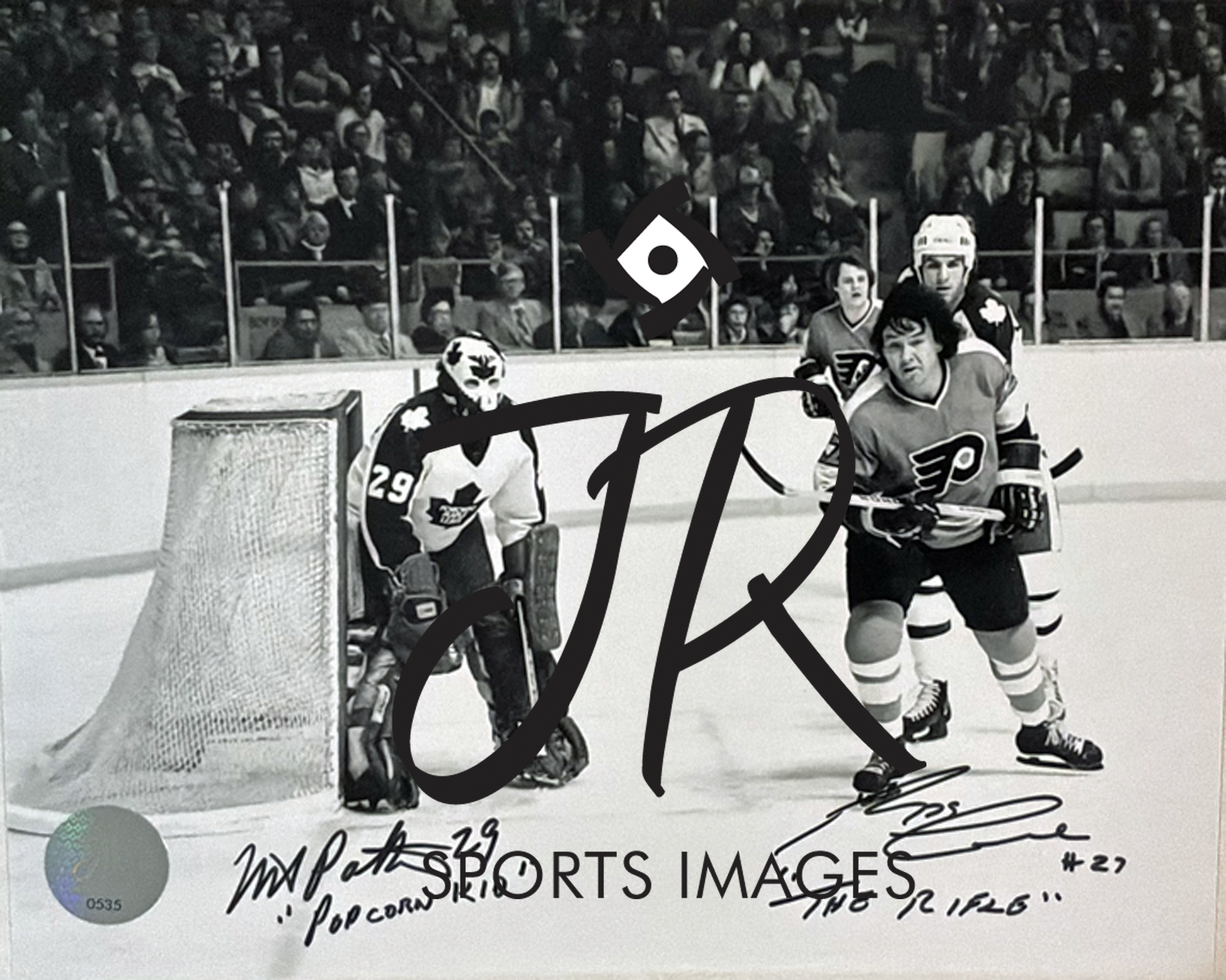 AUTOGRAPHED REGGIE LEACH AND MIKE PALMATEER.png