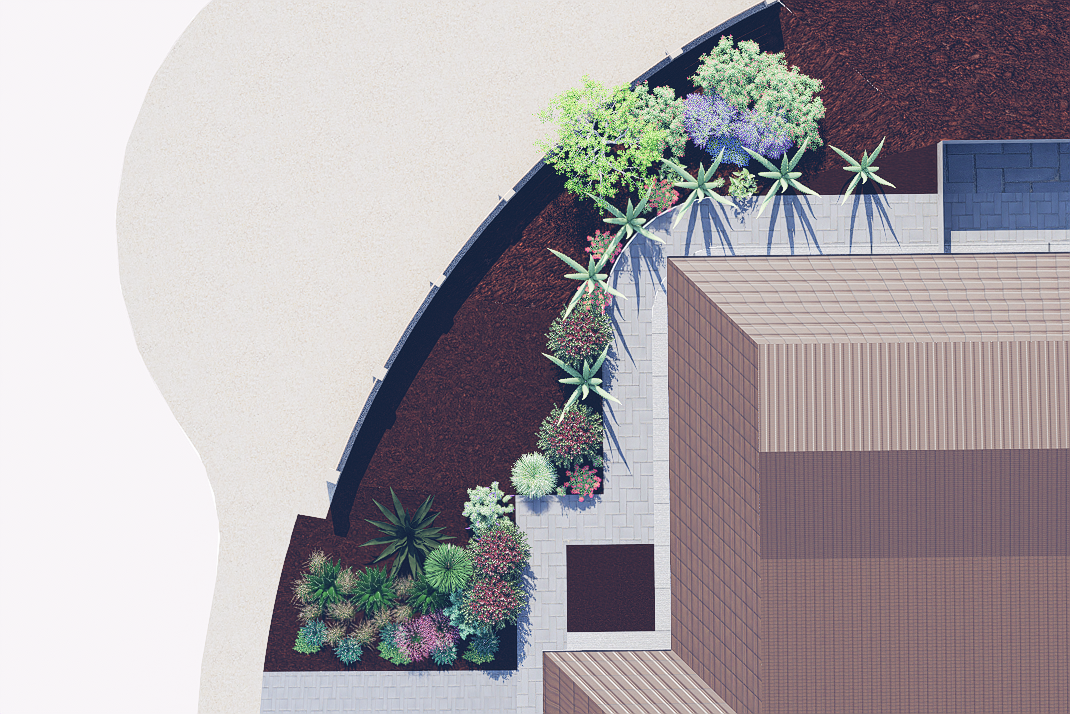 Top-down view of a landscaped area next to a brick building with a curved black fence, featuring various green and purple plants and succulents, with light gray paving stones.
