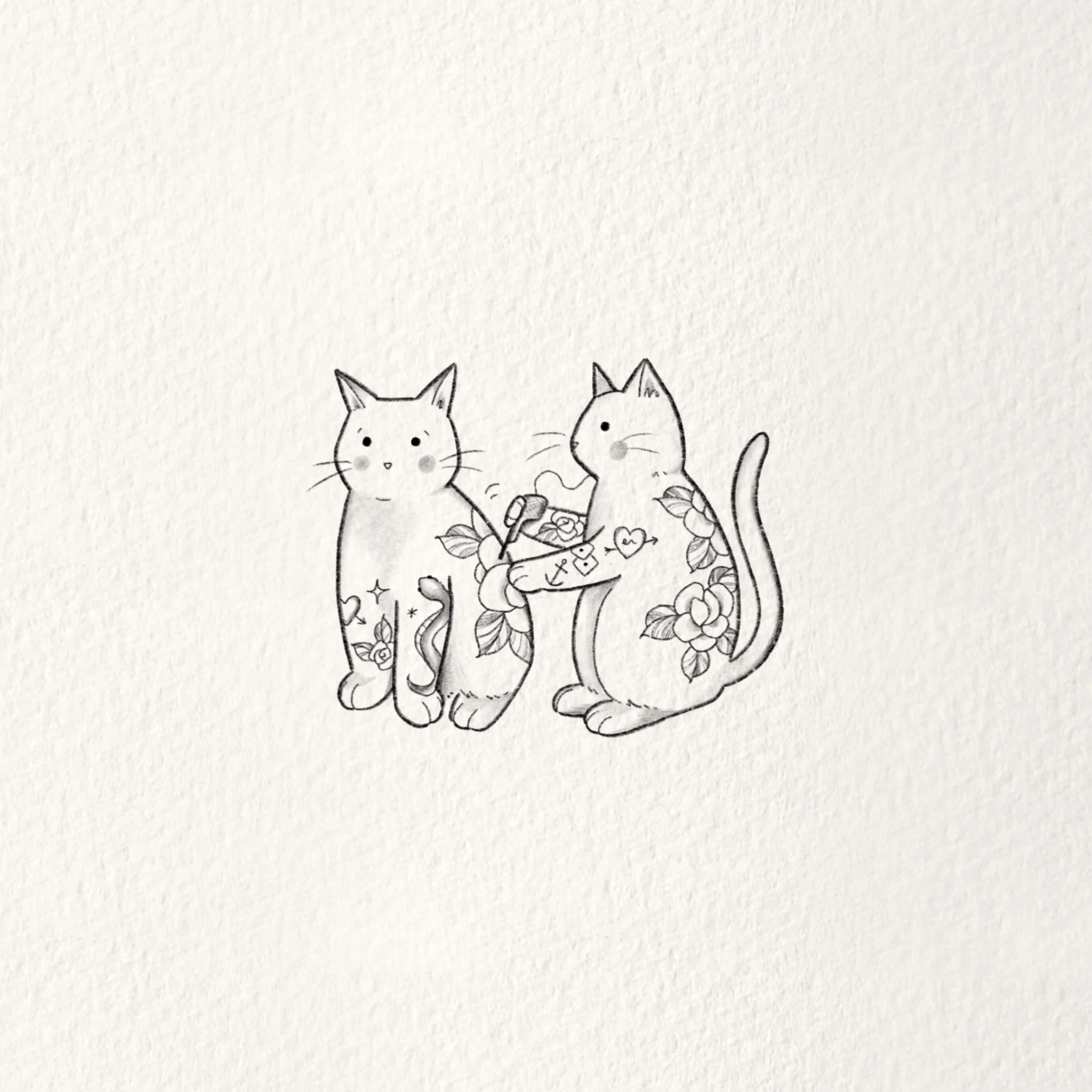 tattooing cats.jpg