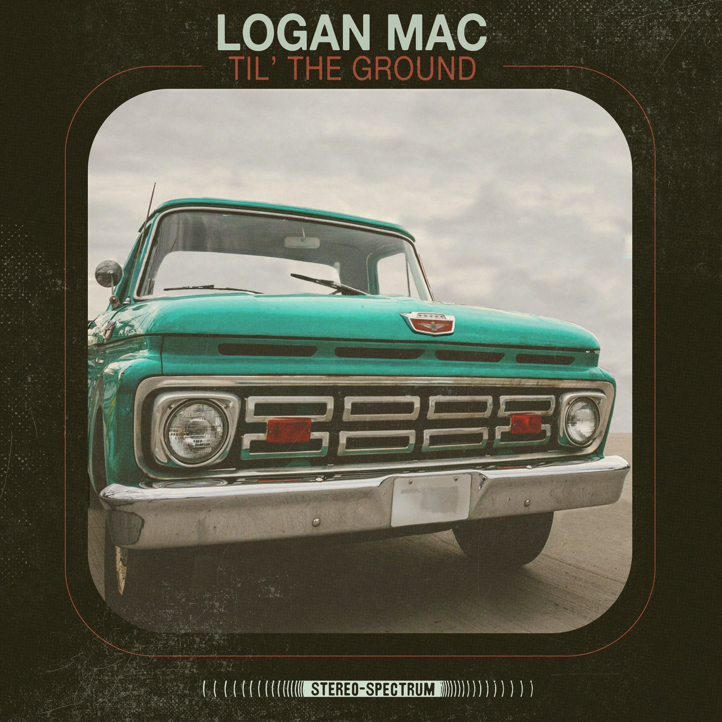Cover of rock album called "Til 'T' the Ground" by Logan Mac, featuring a vintage turquoise truck front with a cloudy sky background, and a black border with red text.