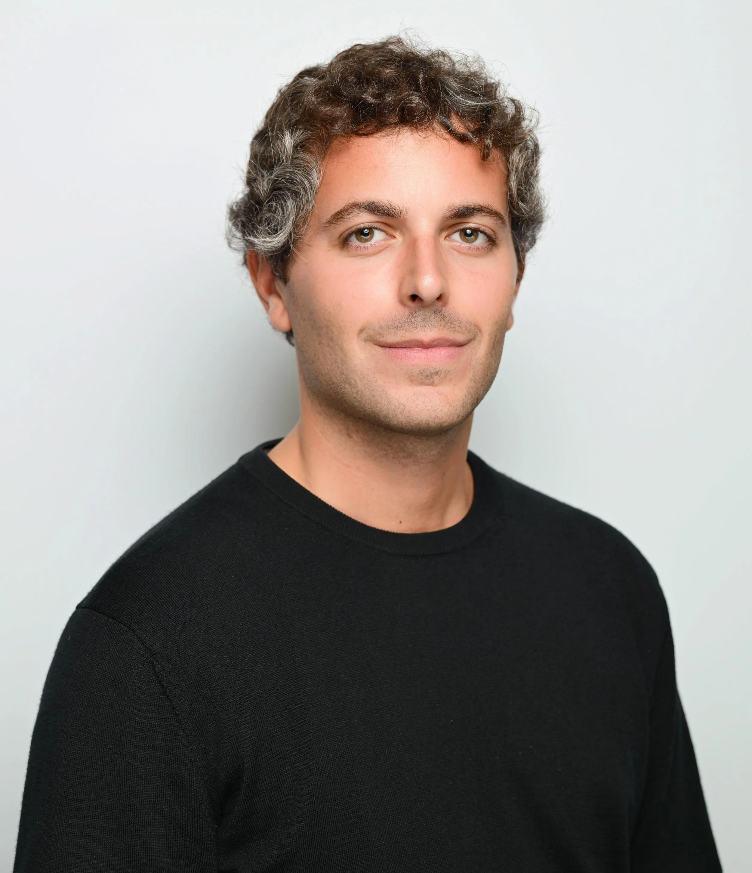 Moodita’s male client smiling after a coaching session.