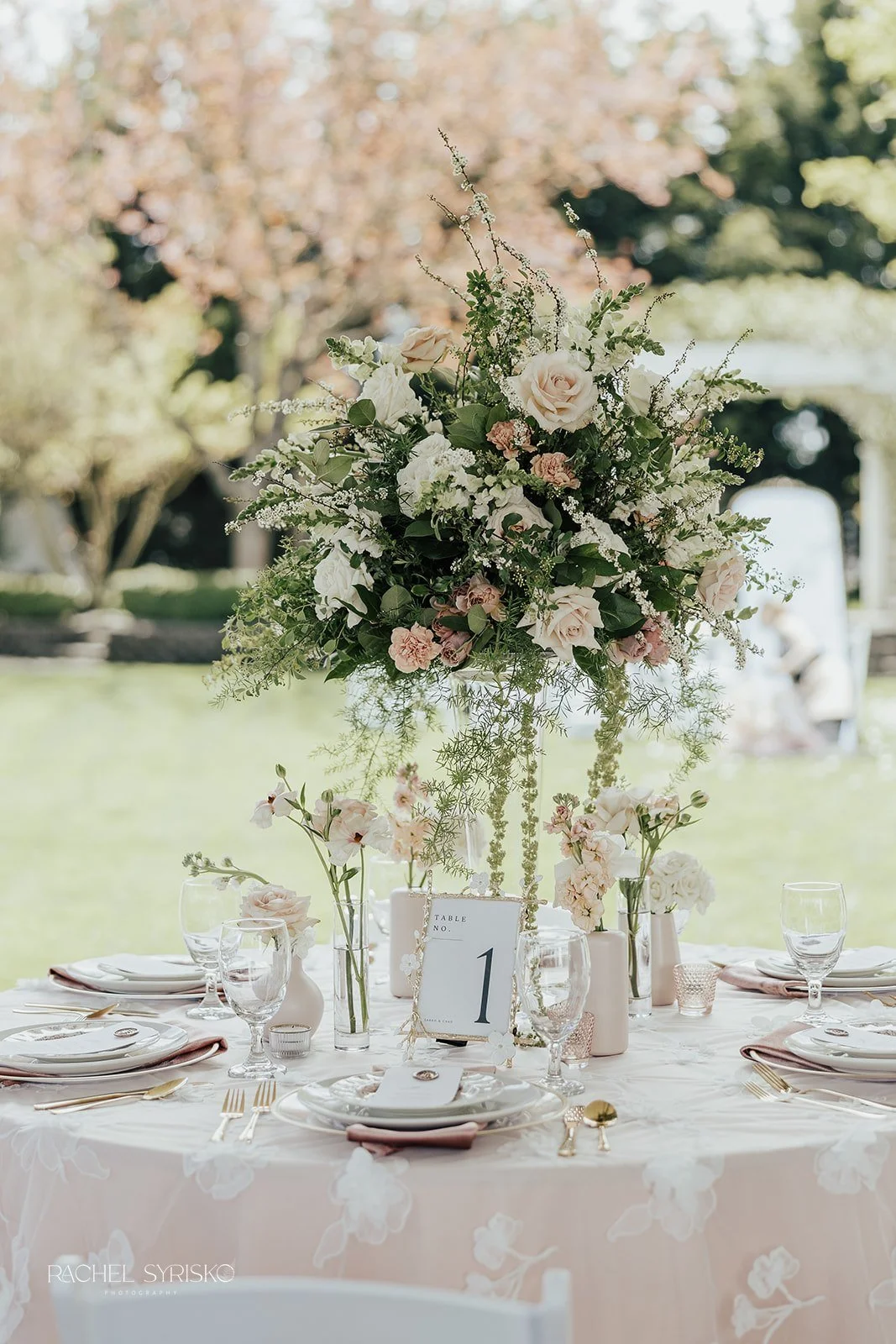guest table with cascading blush and cream florals
