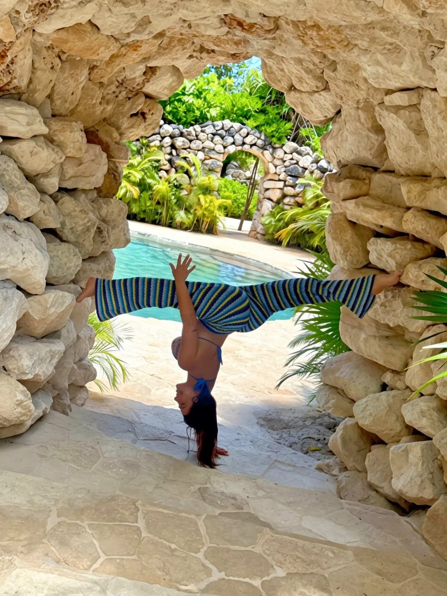 somewhere tropical, doing the coolest thing someone&rsquo;s ever seen 🧊🌴 

Photos by my hubby and he&rsquo;s the cool one here who gave me the idea to hang on that rock arch after he casually did some pull-ups which had someone say that&rsquo;s the