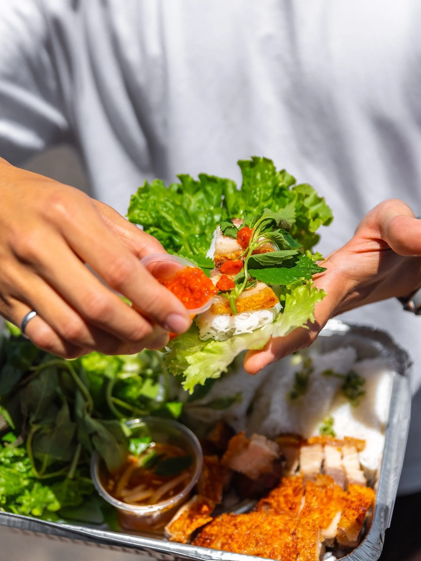 Every bite hits different when you build it yourself 😋 Our B&aacute;nh Hỏi Tray is loaded with crispy pork, fresh greens, vermicelli, and bold flavor in every layer 🥬🔥

Don&rsquo;t forget our B&ograve; Kho promo&mdash;free b&aacute;nh m&igrave; br