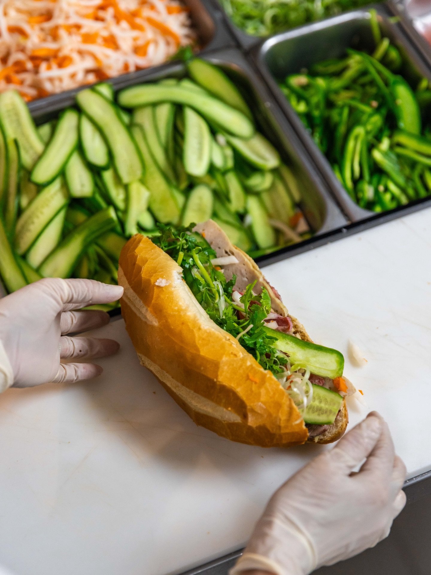 Behind every good b&aacute;nh m&igrave; is crunch, herbs, and pickled veggies doing their job 🥖😋

#ocfood #bakery #pastries #vietnamesedessert #vietnamese