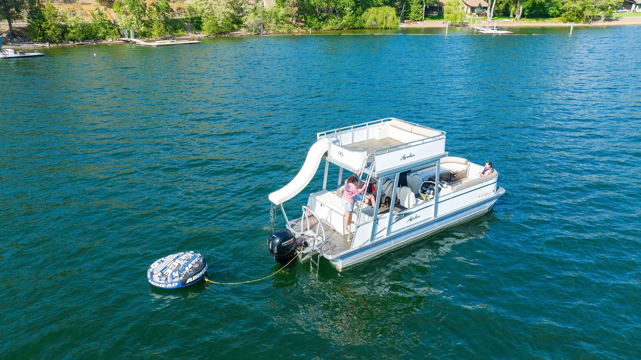 A funship floating with a tube behind it