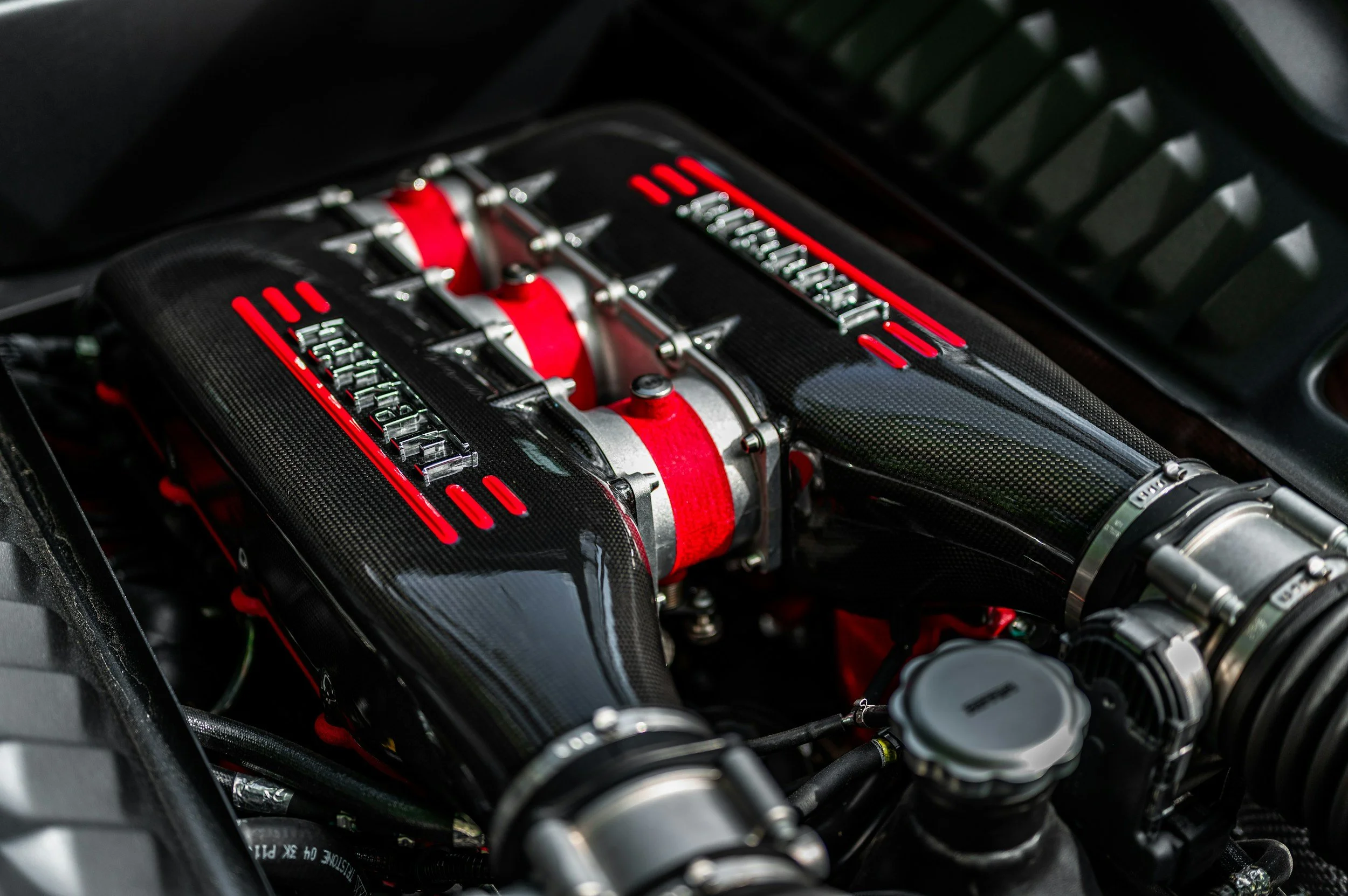 black and red high performance engine Ferrari