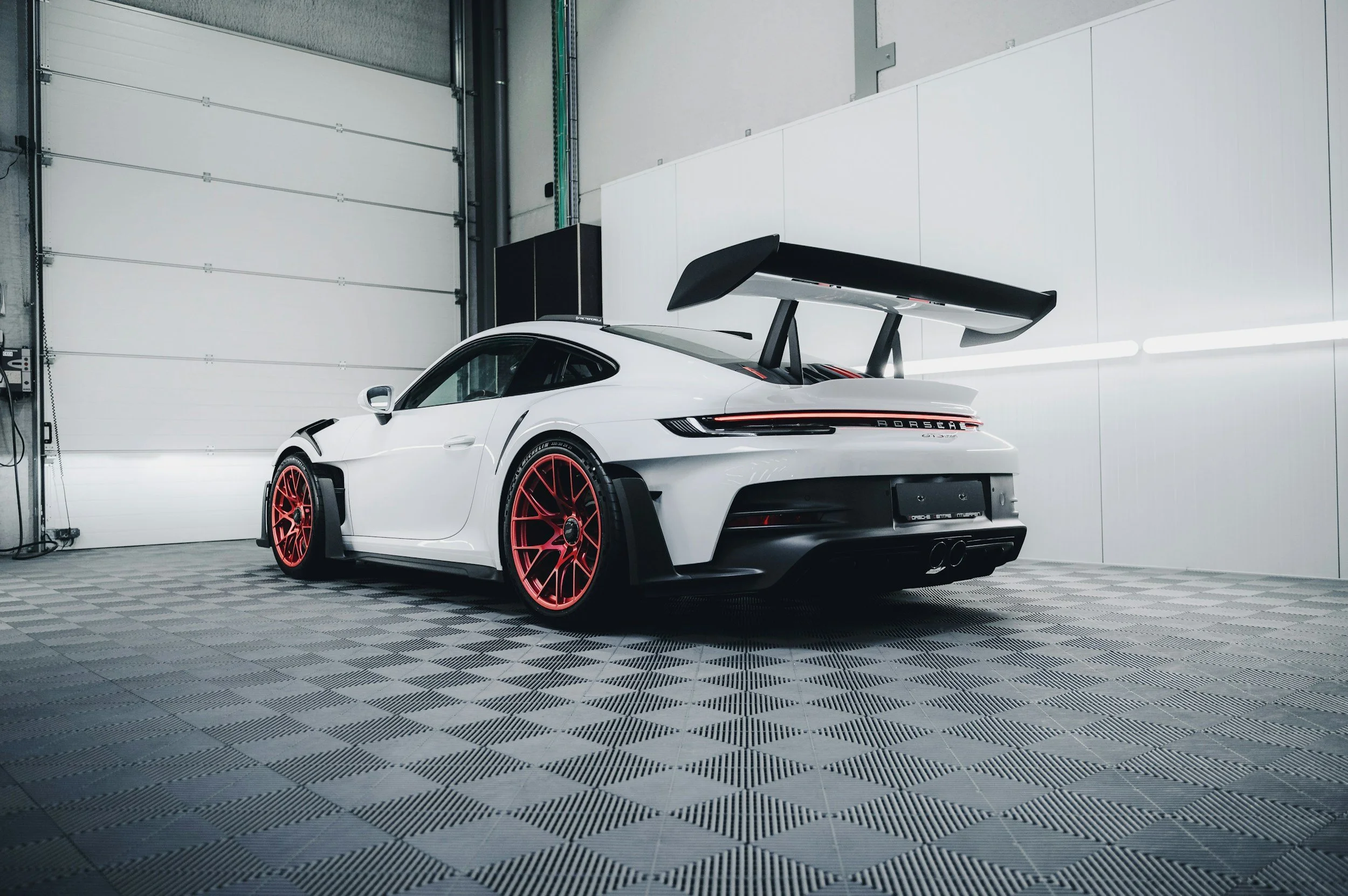white car rear wing red wheels high spoiler