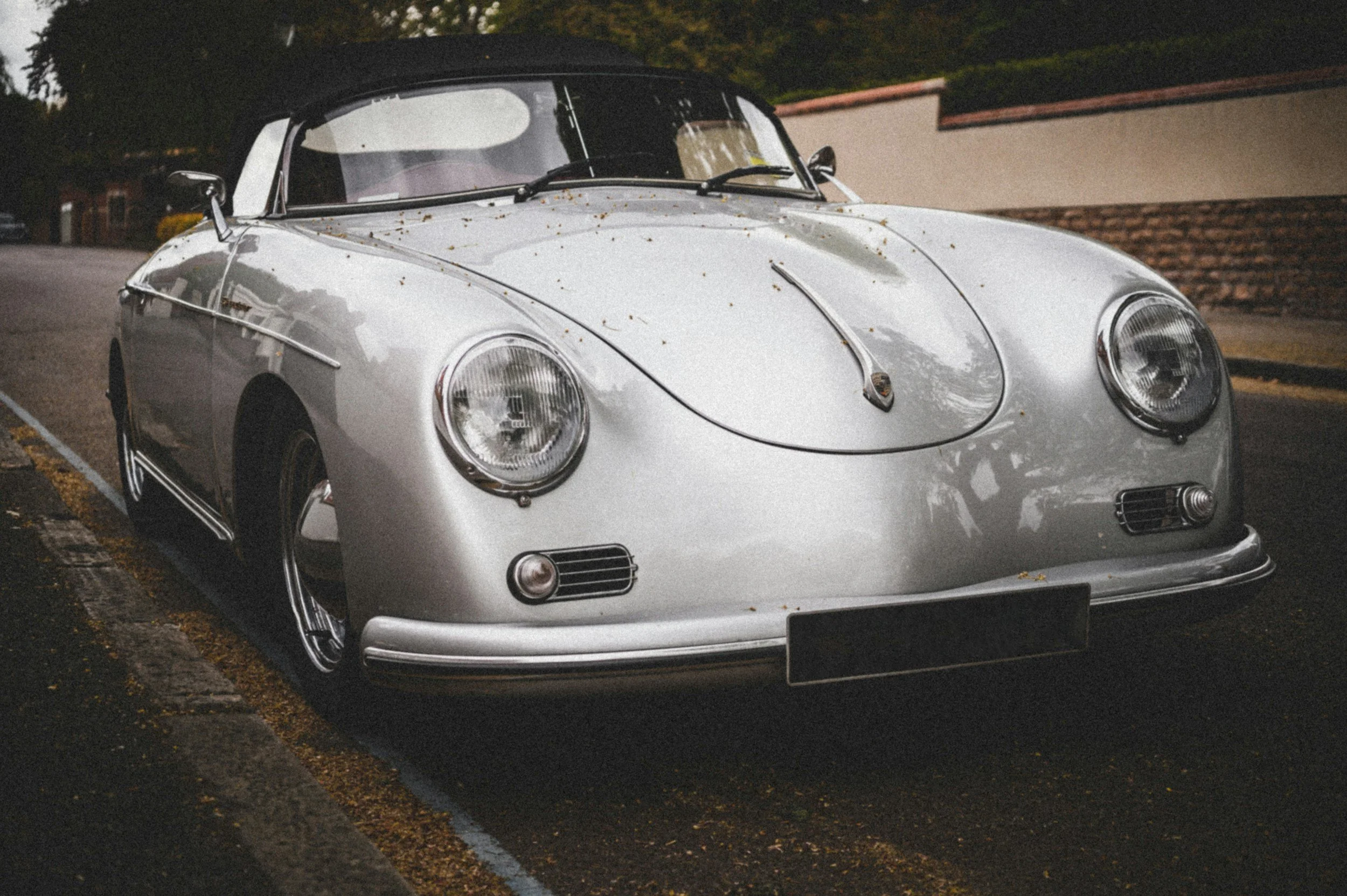 classic silver sportscar Porsche very nice driving on road